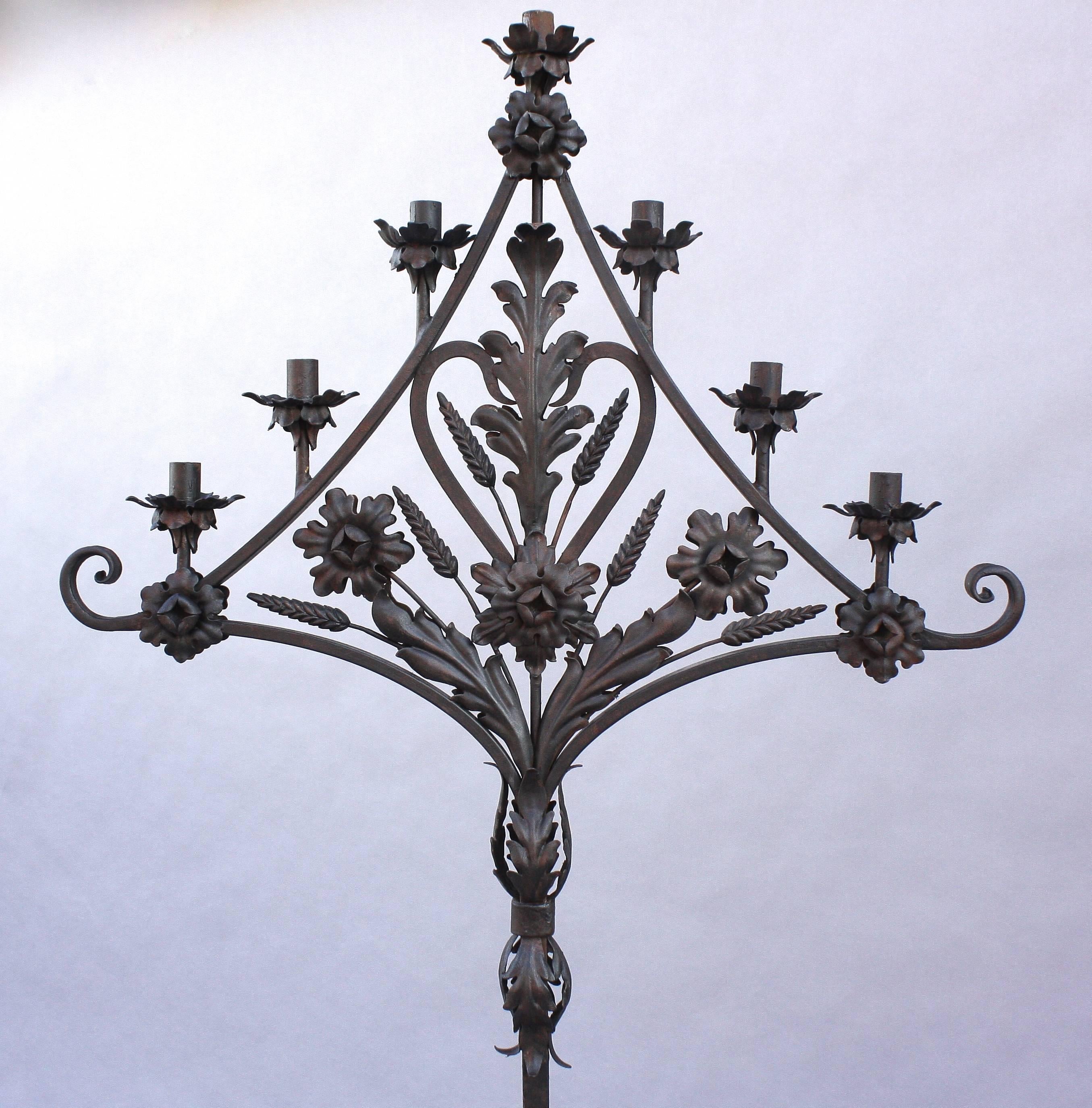 Beautiful quality ironwork, circa 1920s holds seven candles.