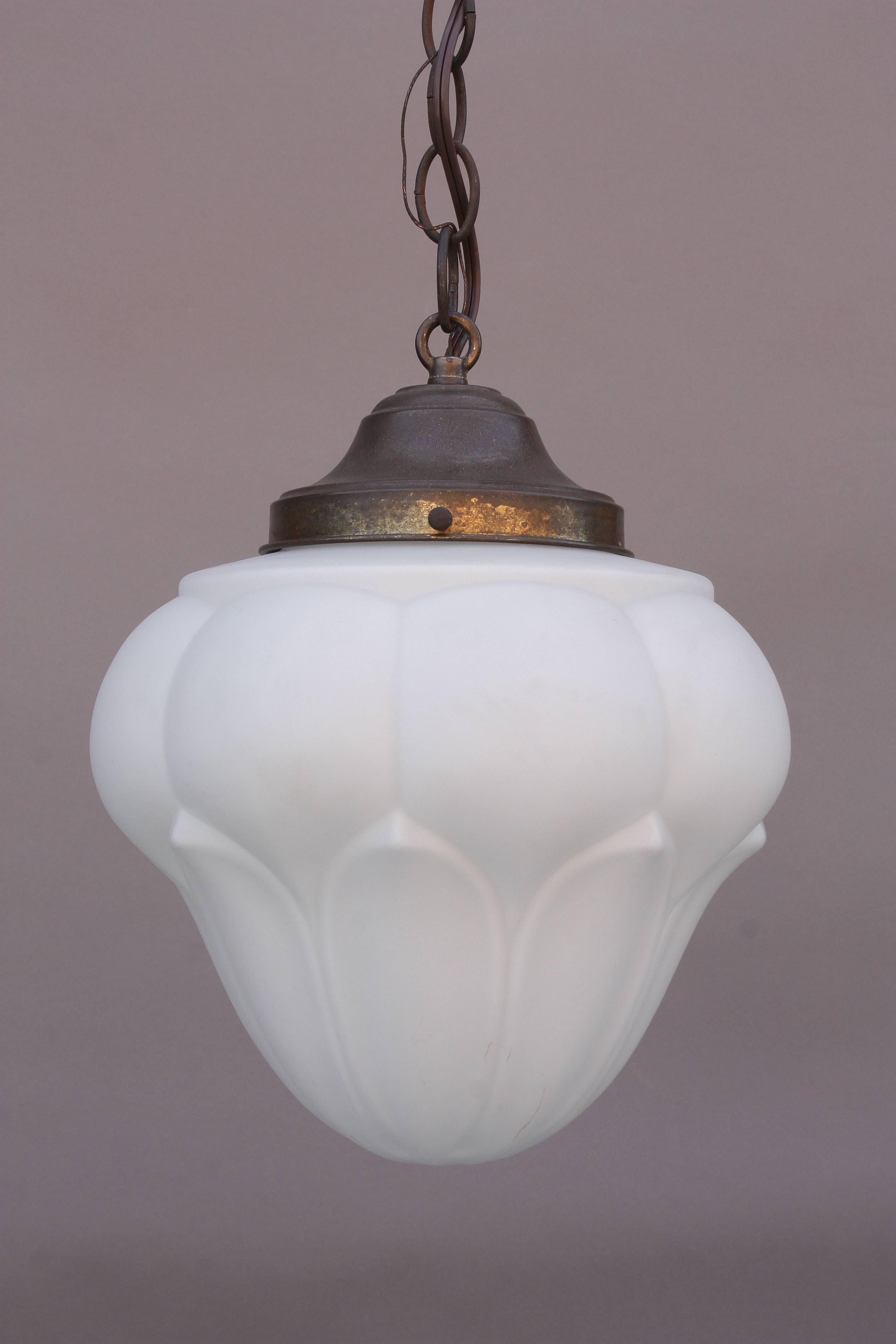 Milk glass fixture with striking acorn shaped globe. Measures: 34