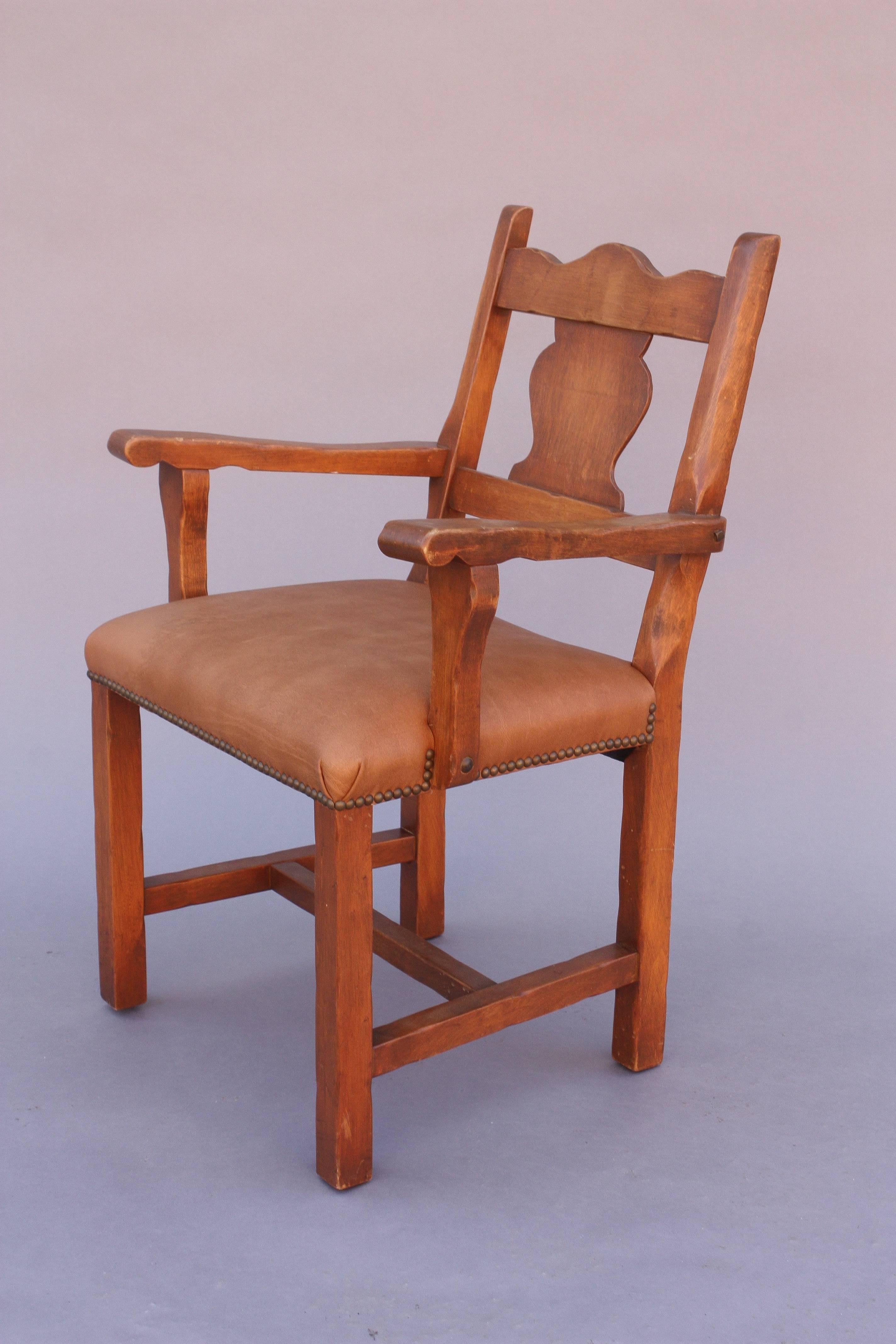 Set of ten Monterey chairs with new leather upholstery, Circa 1930s.

Two side chairs measure 37