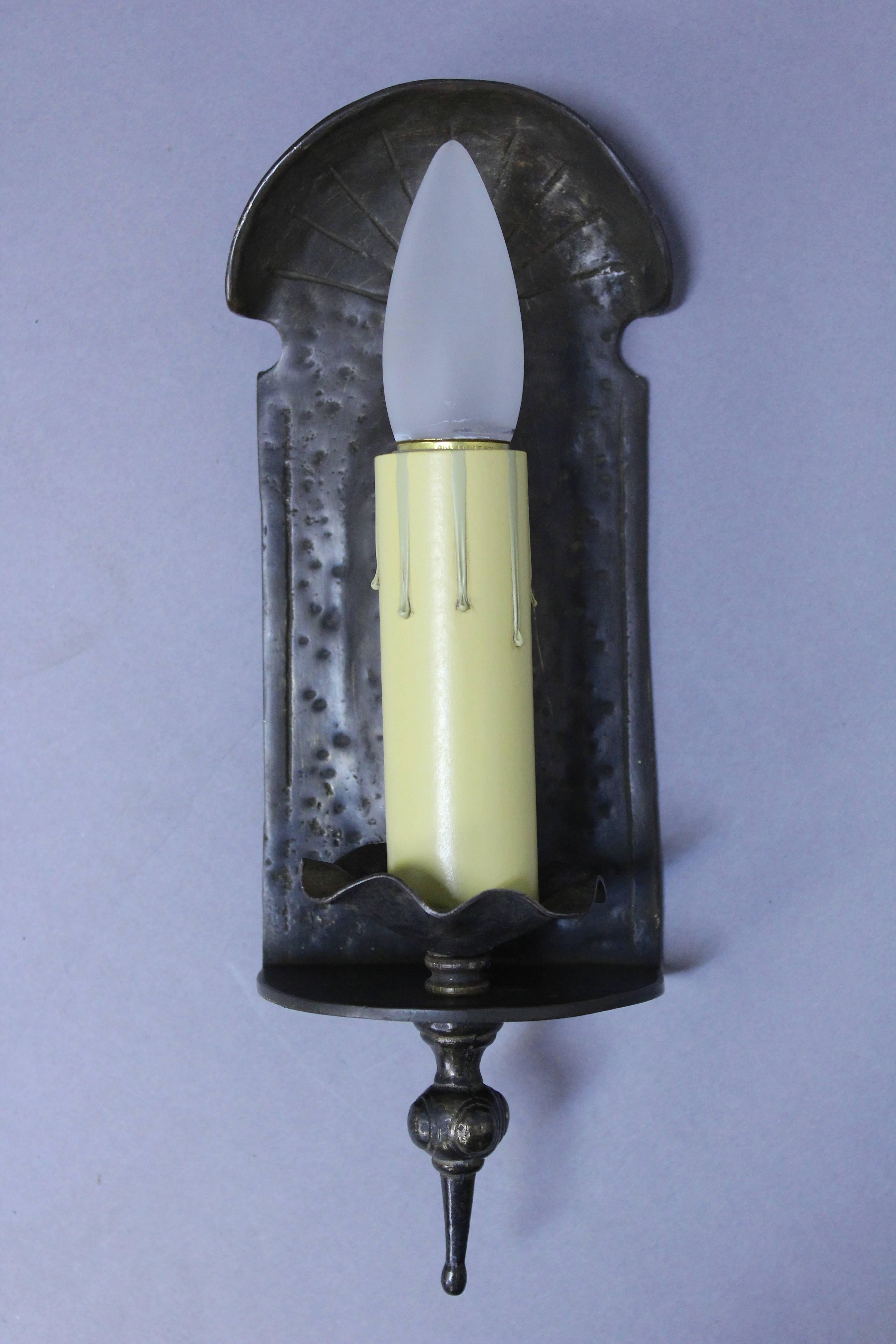 Pair of simple single sconces with hammered texture, circa 1920s.