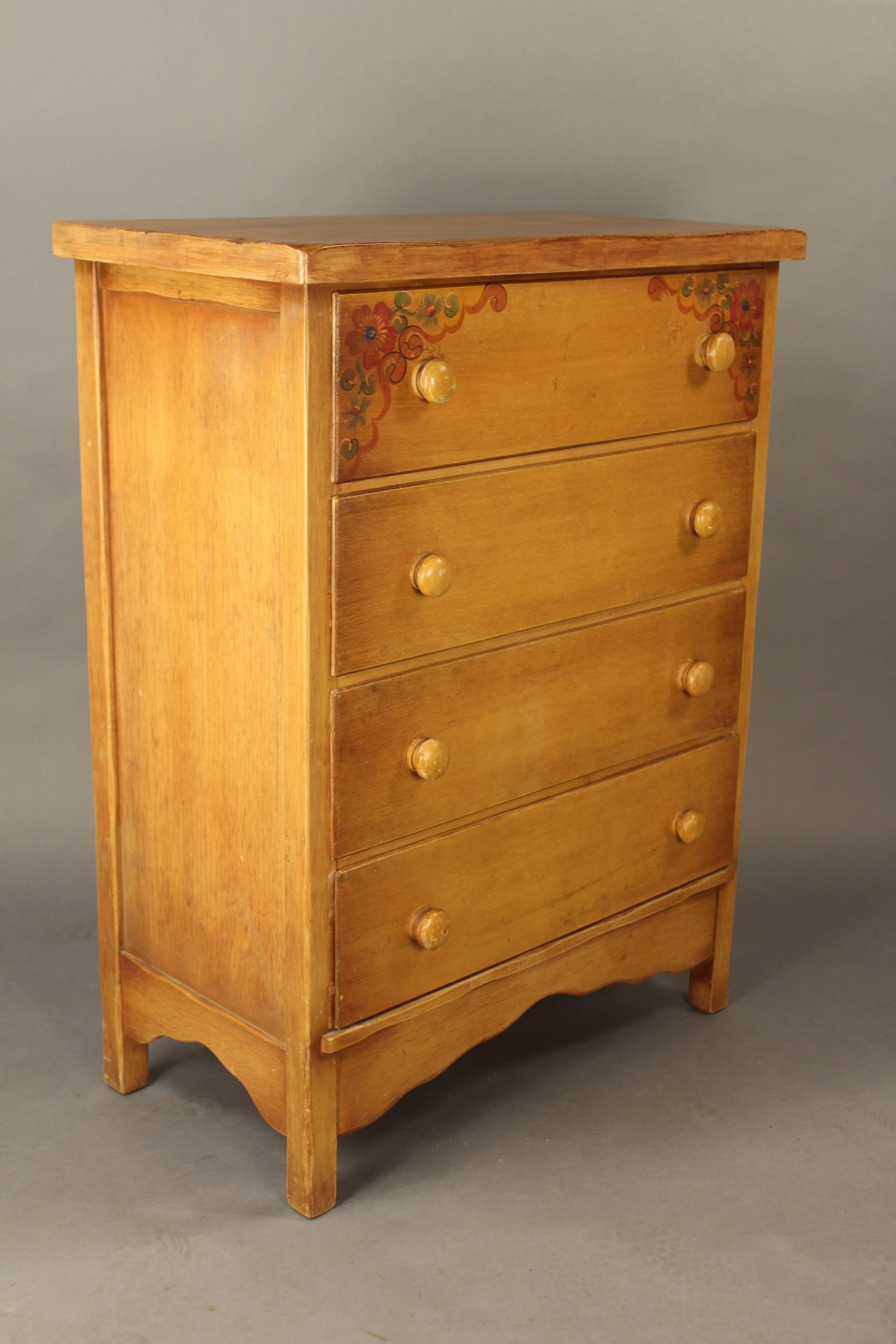 Charming 1930s signed Coronado Cie dresser with hand-painted floral designs in the corners.