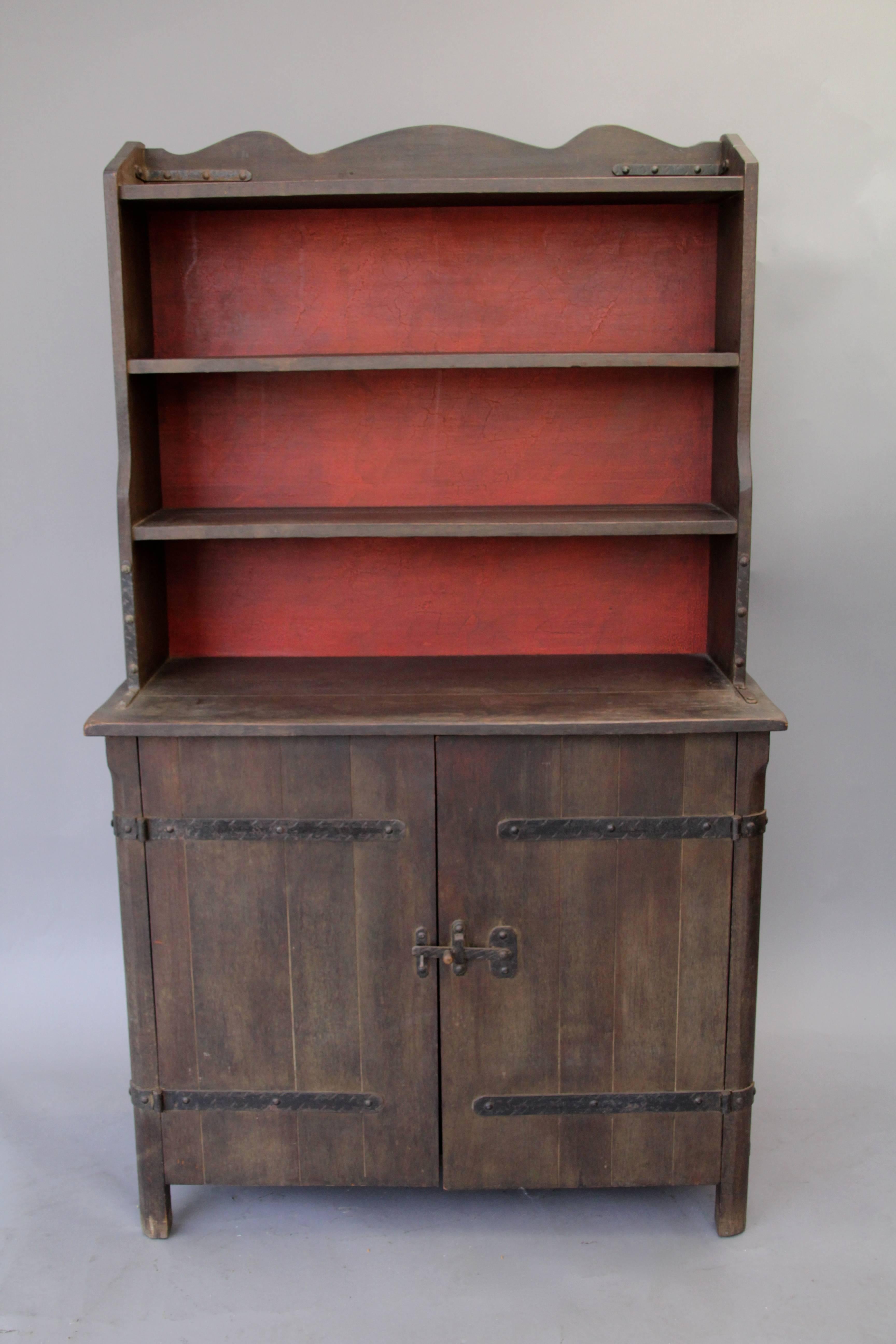 Signed Monterey hutch with original finish, circa 1930s. Attractive red and old wood finish.