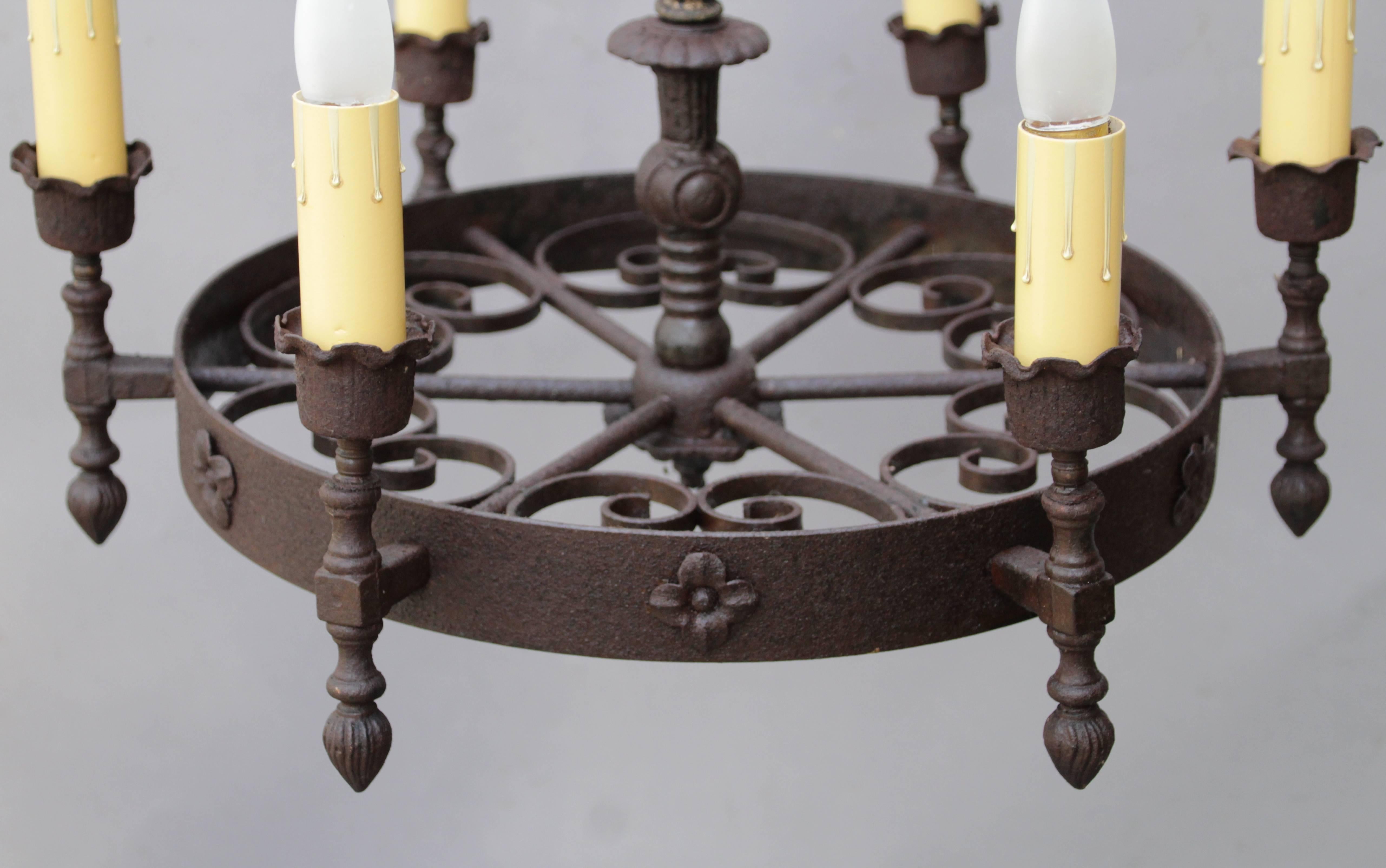 circa 1920s. Classic six-light Spanish Revival chandelier with great visual elements.