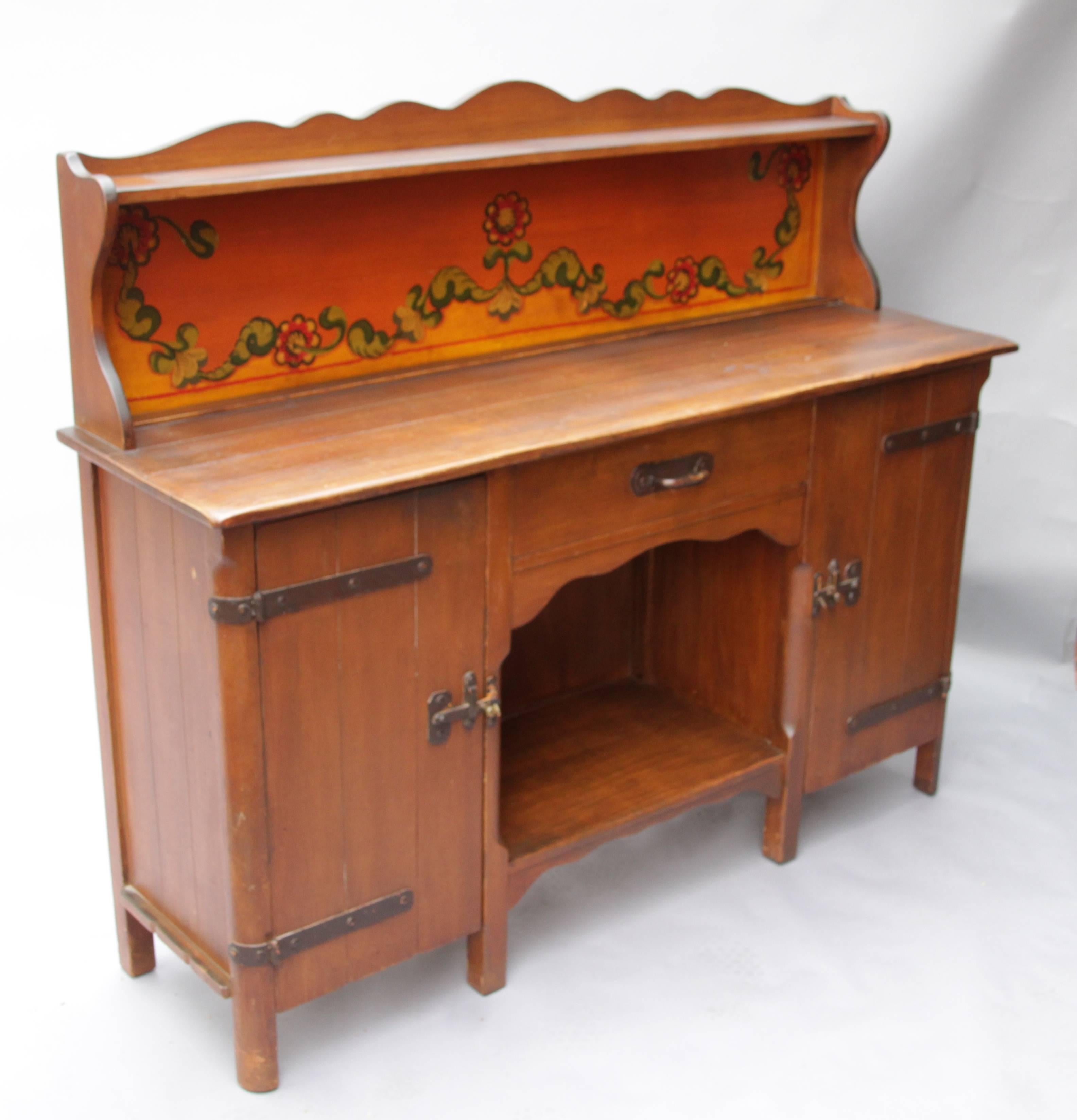 Signed Monterey sideboard with original finish and wrought iron hardware.
