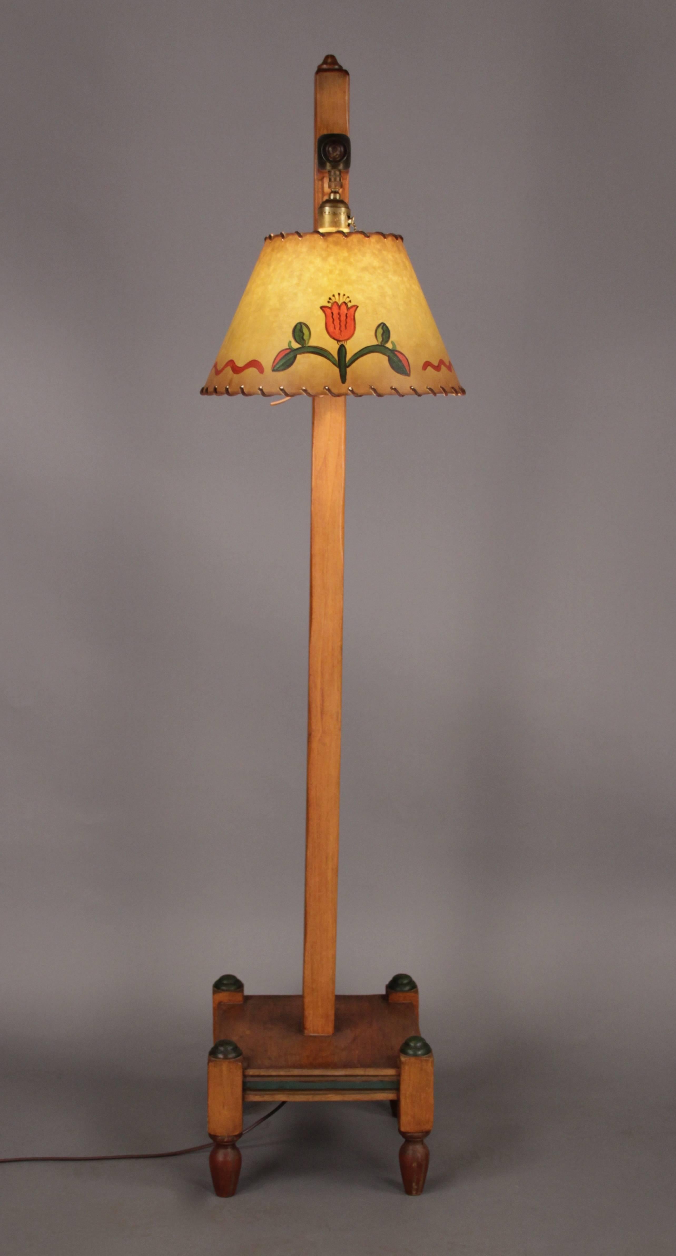 1930s wooden floor lamp with original paint and patina. Hand-painted contemporary shade with leather lacing.