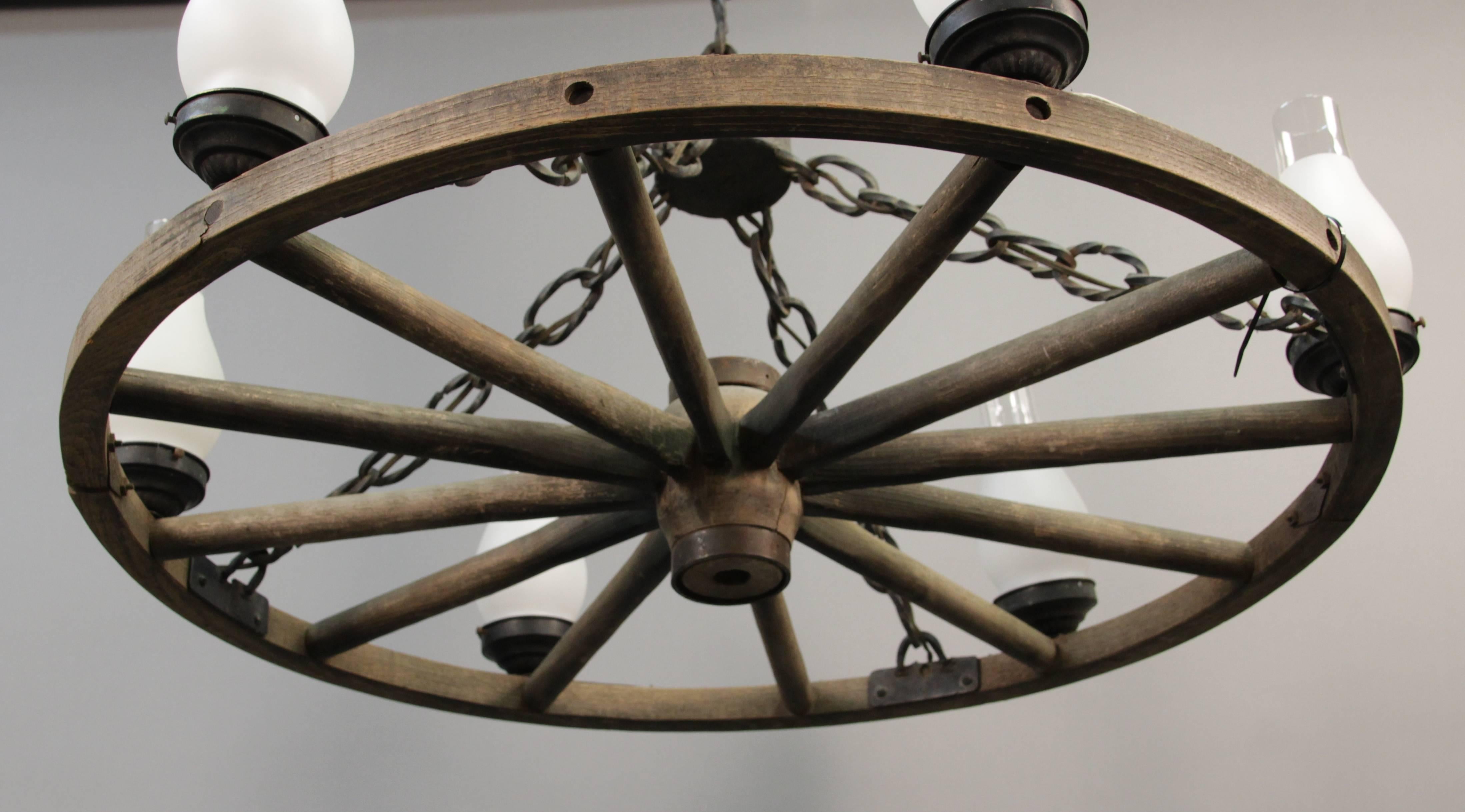 American 1 of 2 Large 1930s Wagon Wheel Rancho Chandelier