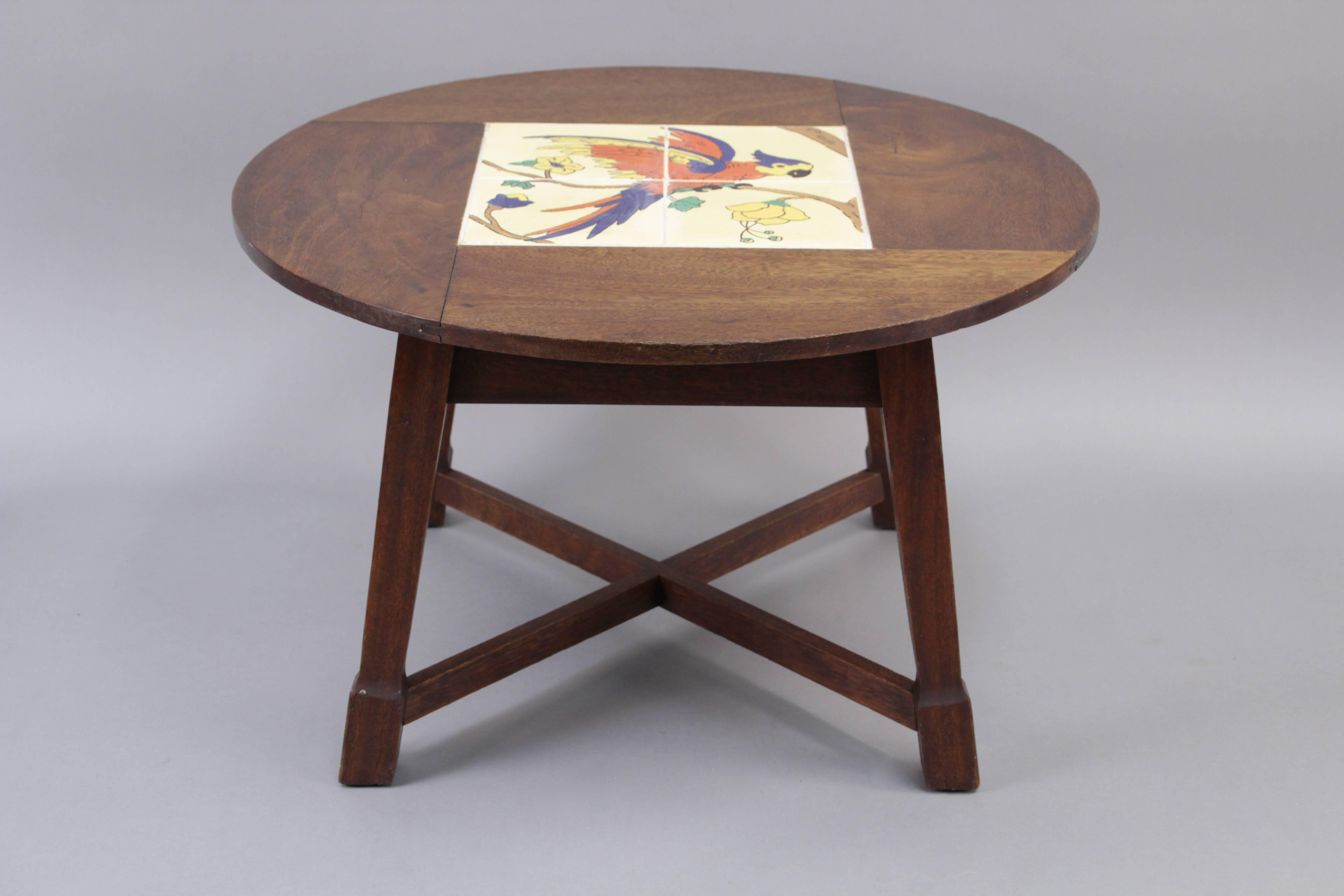 Tile table by the Taylor company with bird motif, circa 1920s.