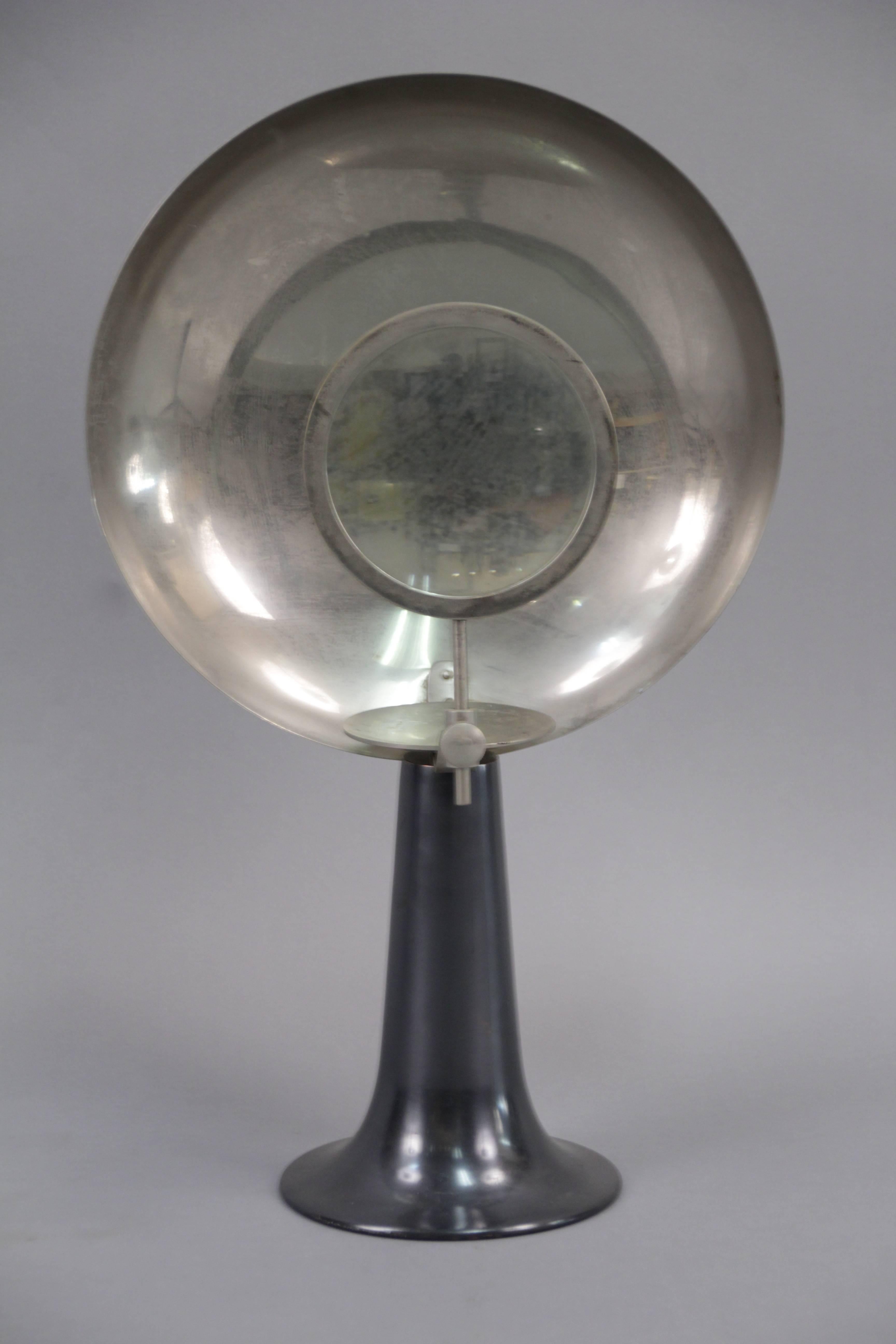 Wonderful magnifying candle lamp. Old medical or scientific lamp.