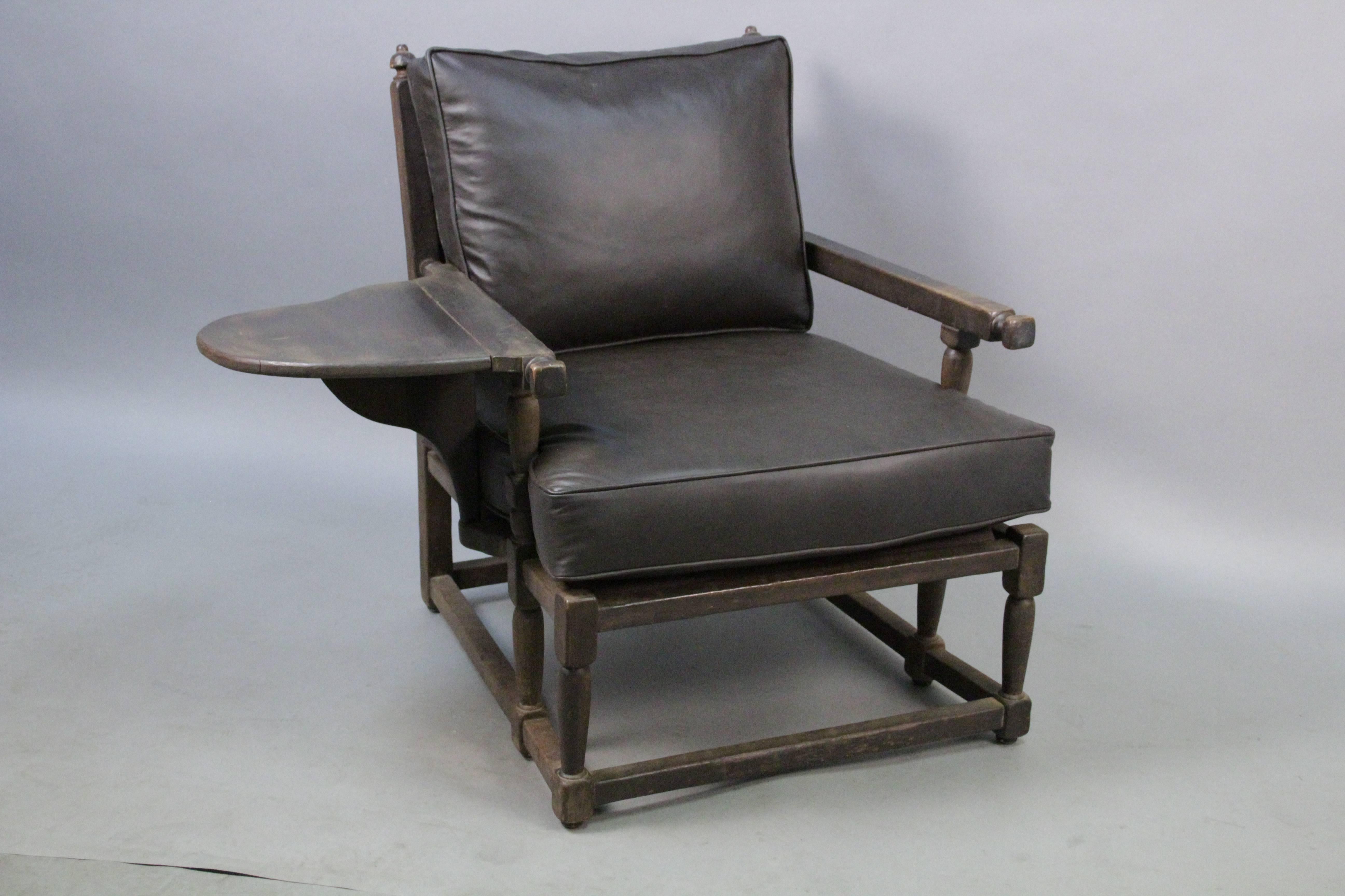 Early Monterey chair in original old wood finish. New leather upholstery. 

With side arm open this chair measures 42 W. 34.5" H x 30.5" W x 34" D x 18.5" seat height.