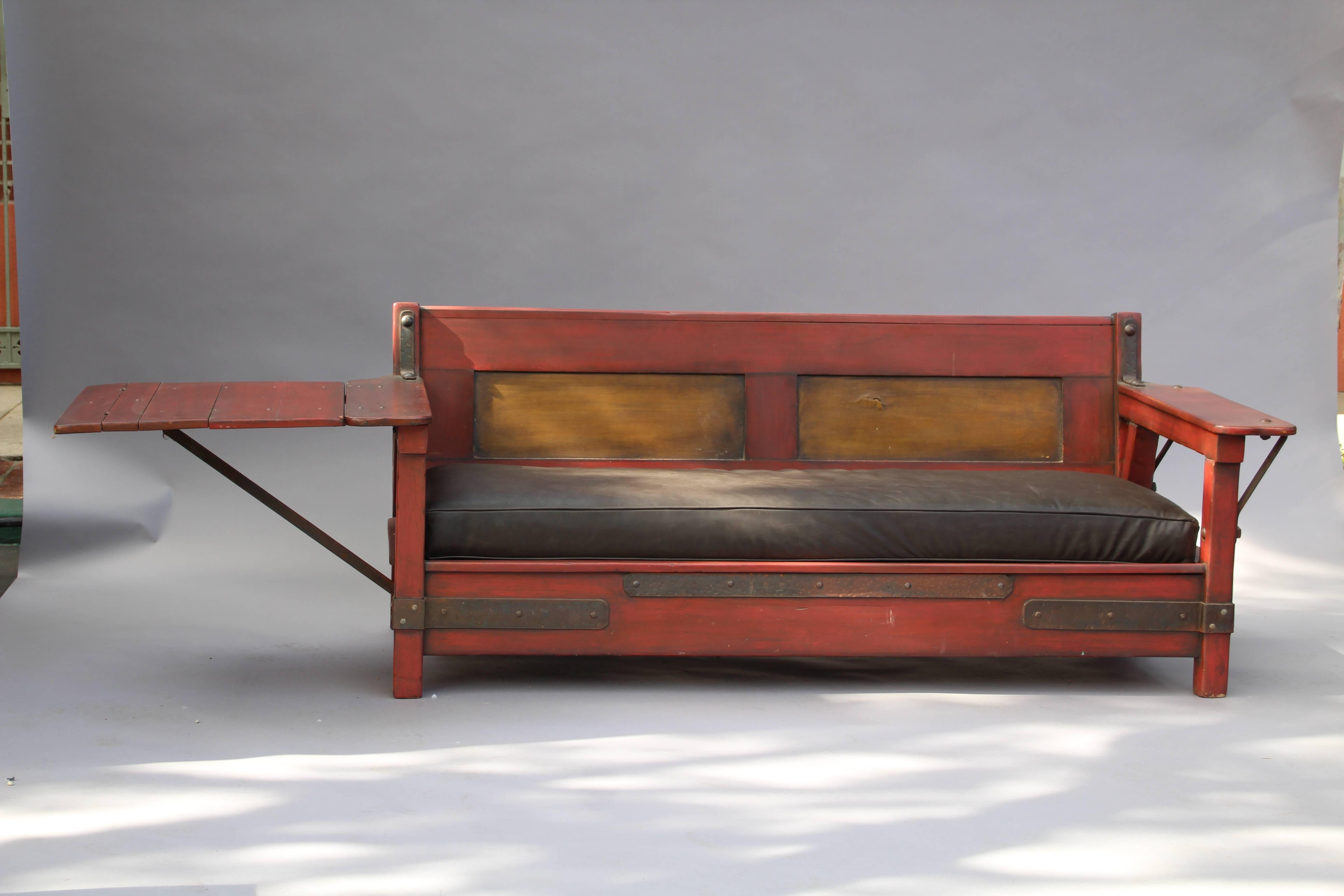 Circa 1930's Monterey red couch with one drop arm. Signed. Finish was restored years ago. 
103.75