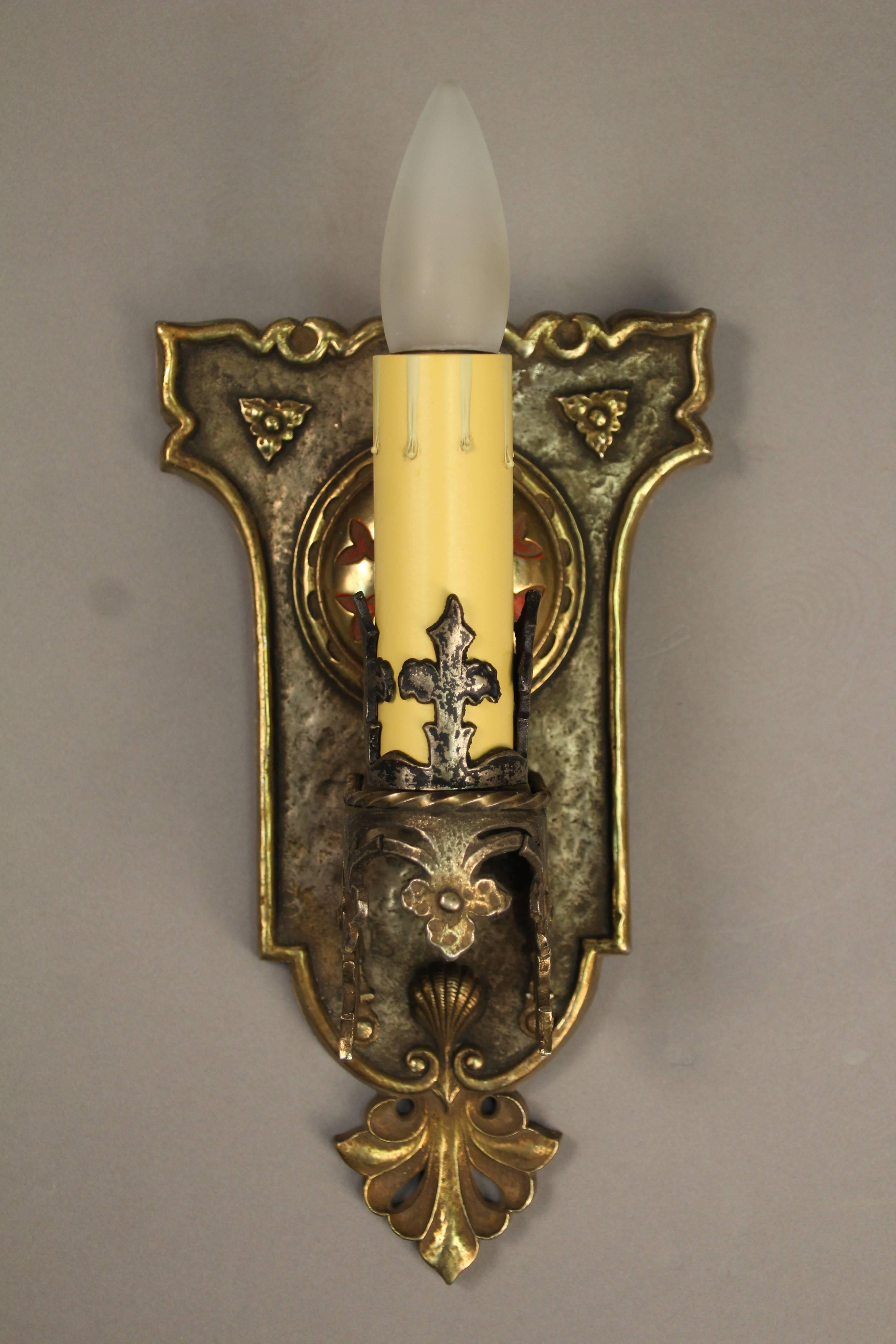 Single sconce, circa 1920s with gold and polychrome finish.