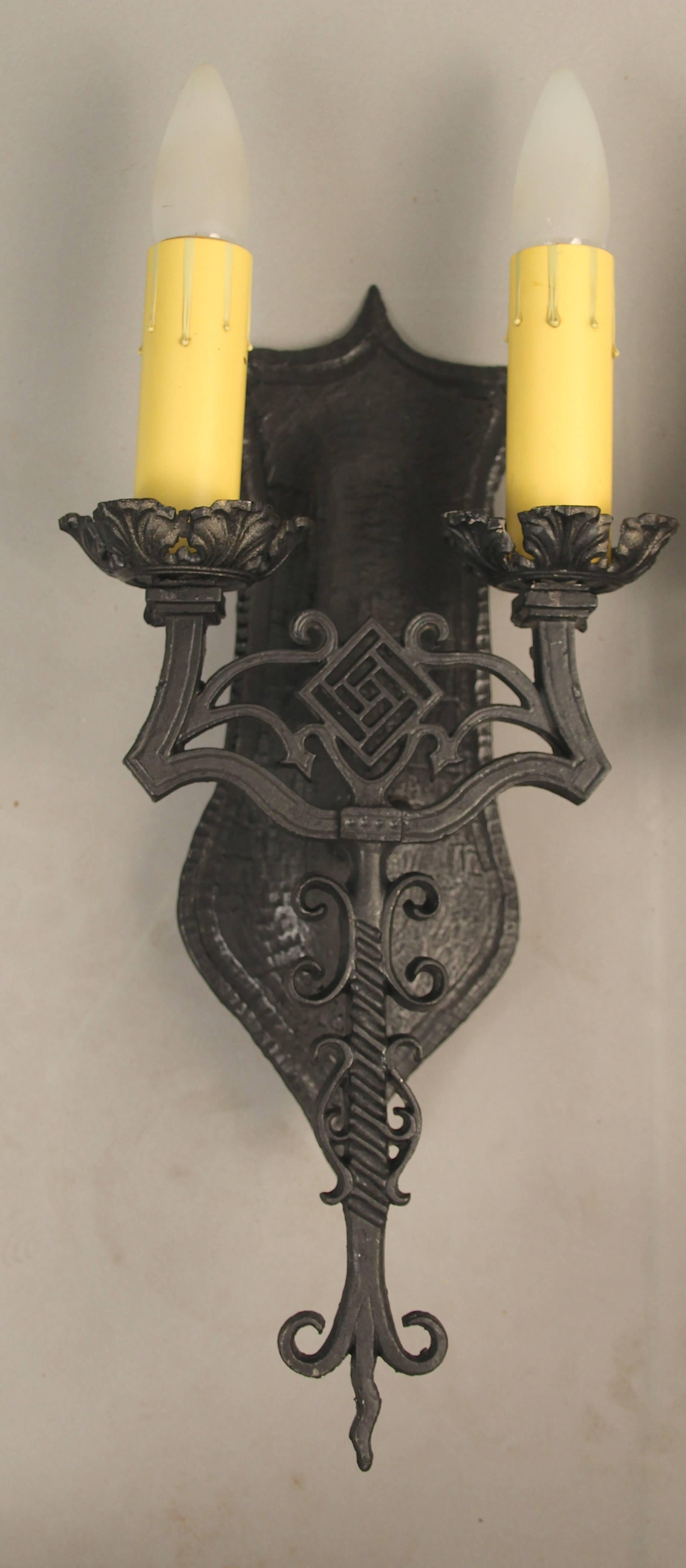Pair of double sconces with attractive filigree pattern, circa 1920s.