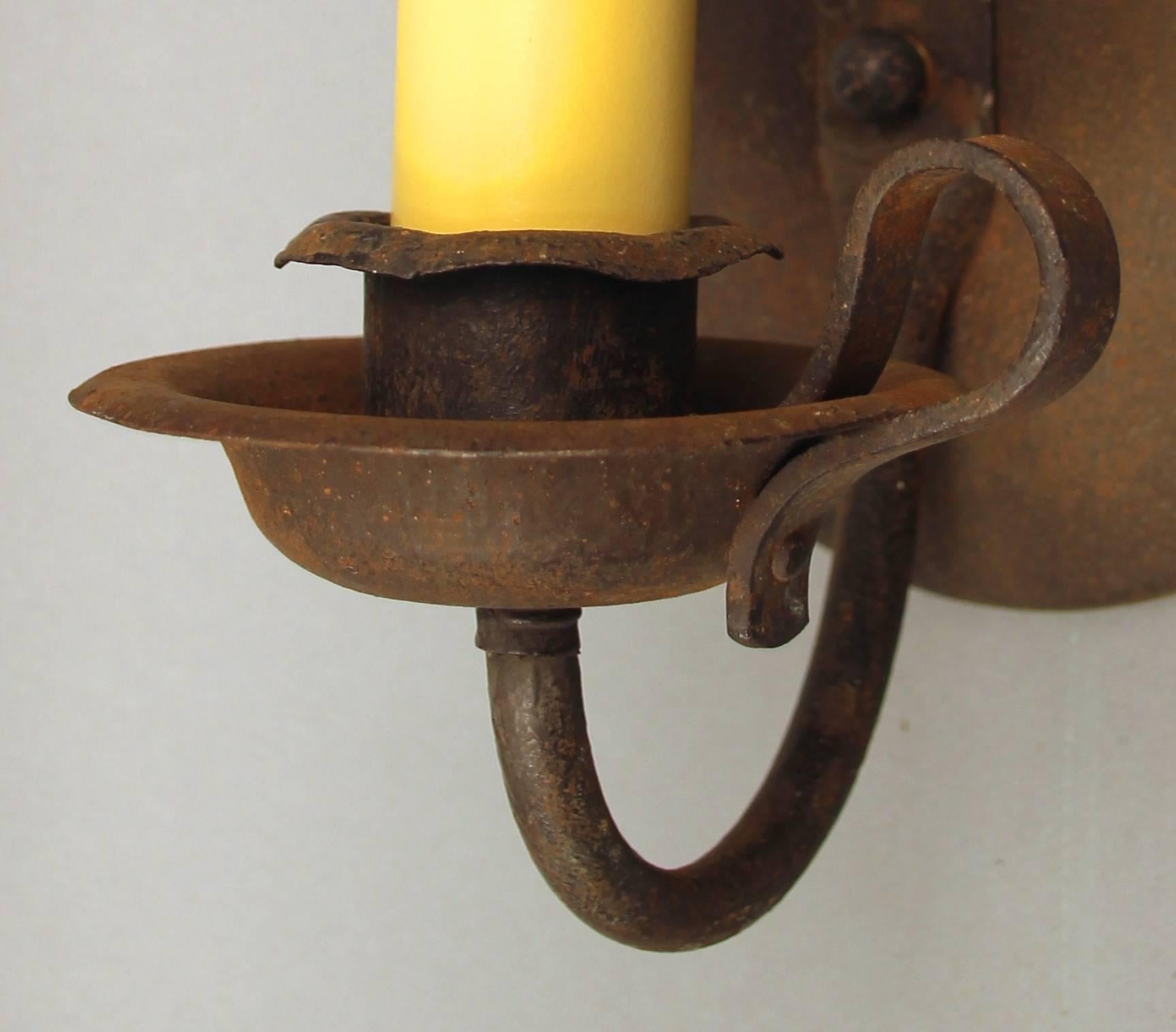 Simple 1920s wrought iron single light sconces. Perfect for Monterey or Spanish Revival homes.