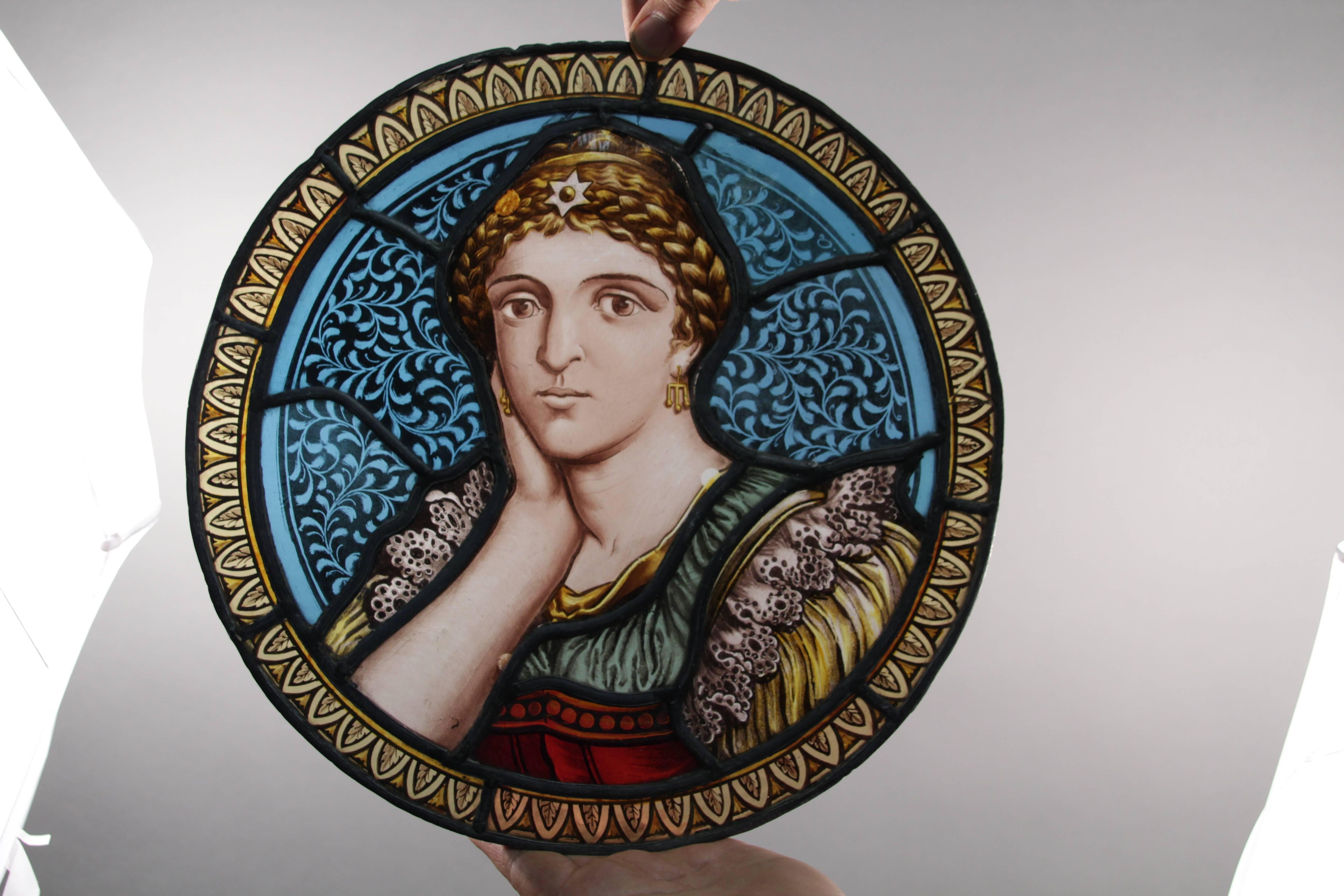 Lovely stained glass panel with beautiful hand-painted of archaic Greek poet, Sappho, known for her poems of love and women.

  