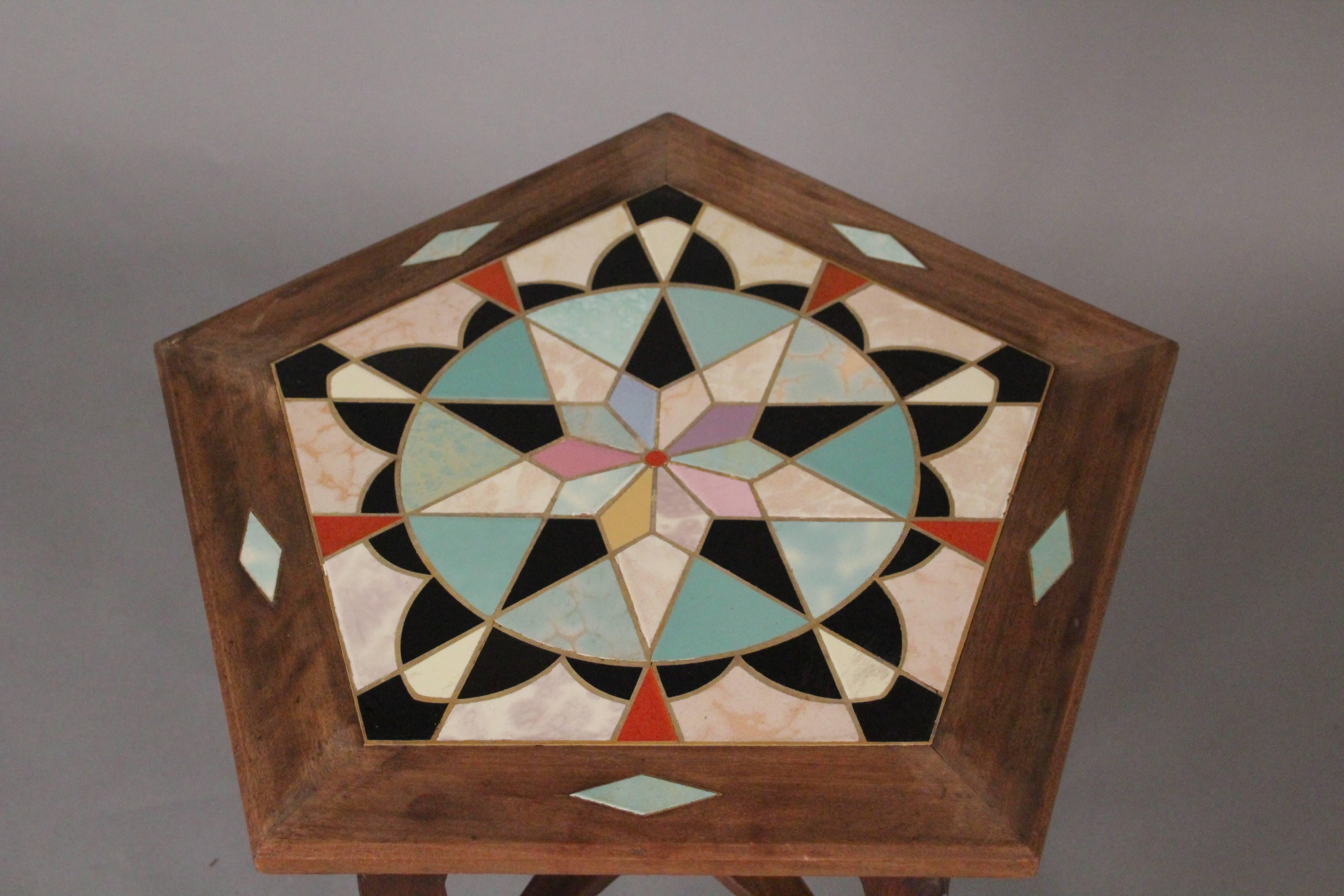 Exceptional hexagonal tile table with beautiful star motif, circa 1920s.