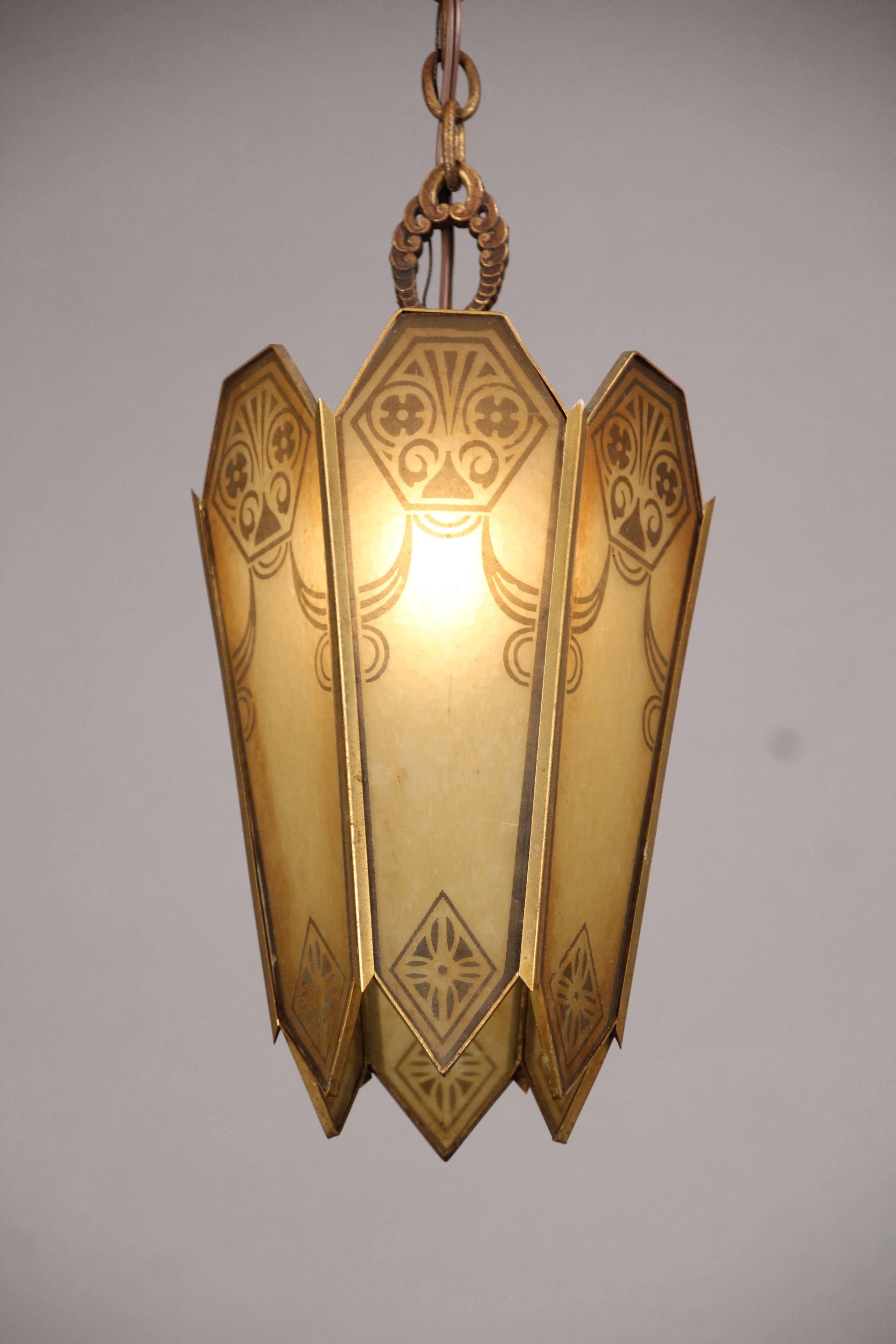 Wonderful Machine Age Art Deco pendant chandelier with original glass and original finish.