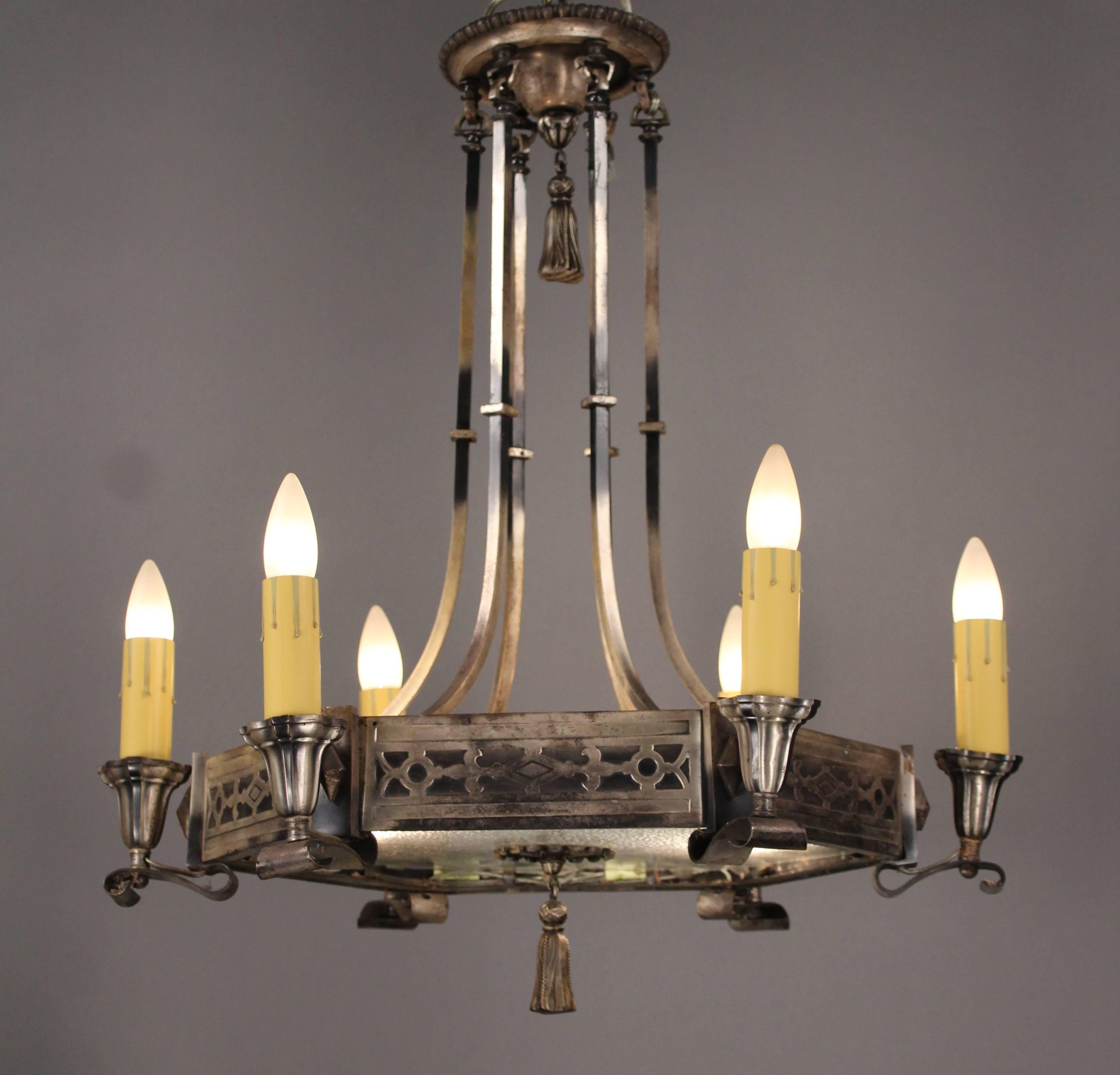 Elegant six-light chandelier with original lit glass bottom. Original silver / pewter tone finish. Measure: 27.5