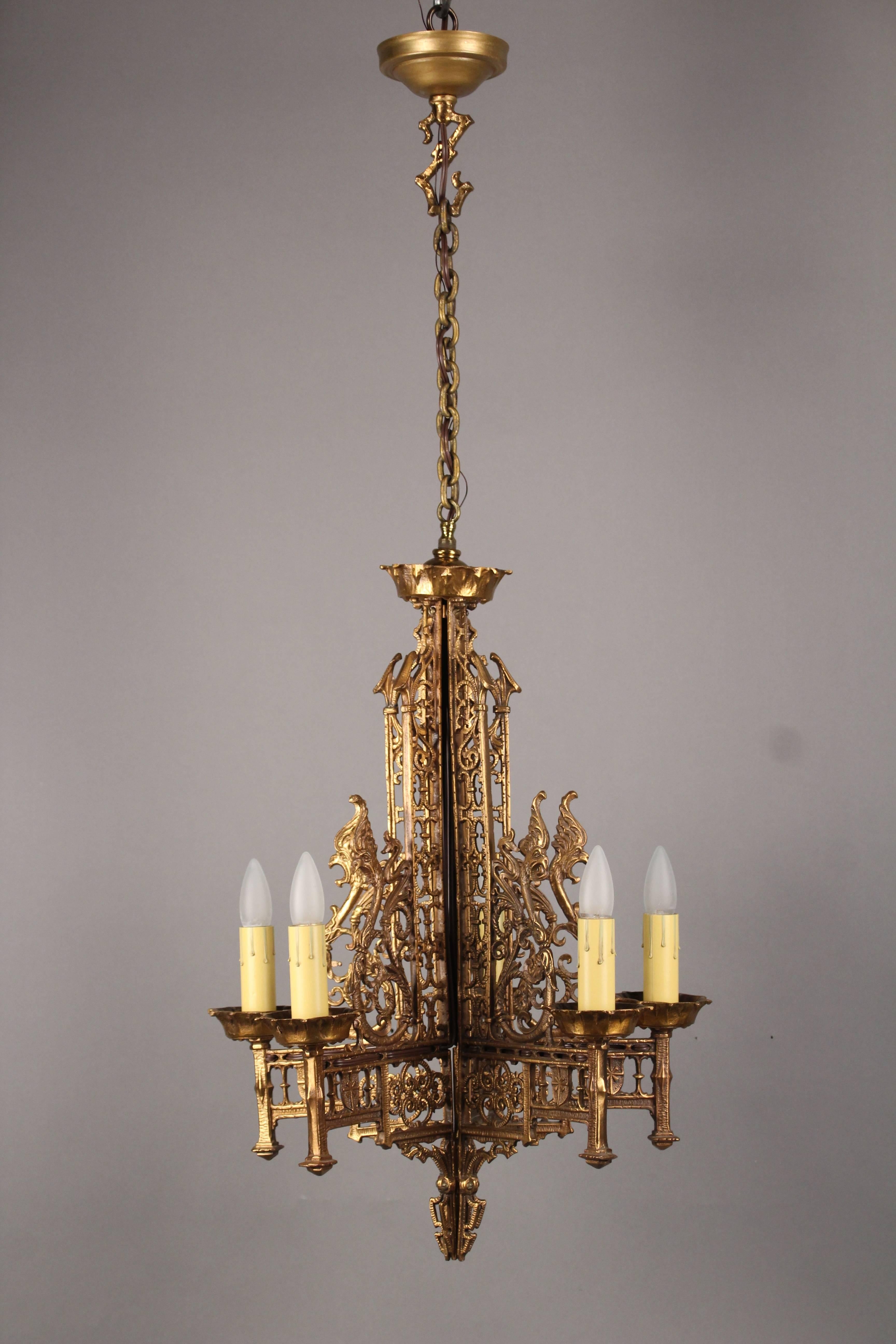 Five-light 1920s chandelier with great casting of mythical creatures. A wonderful piece for an English Tudor or Gothic style home 28.5