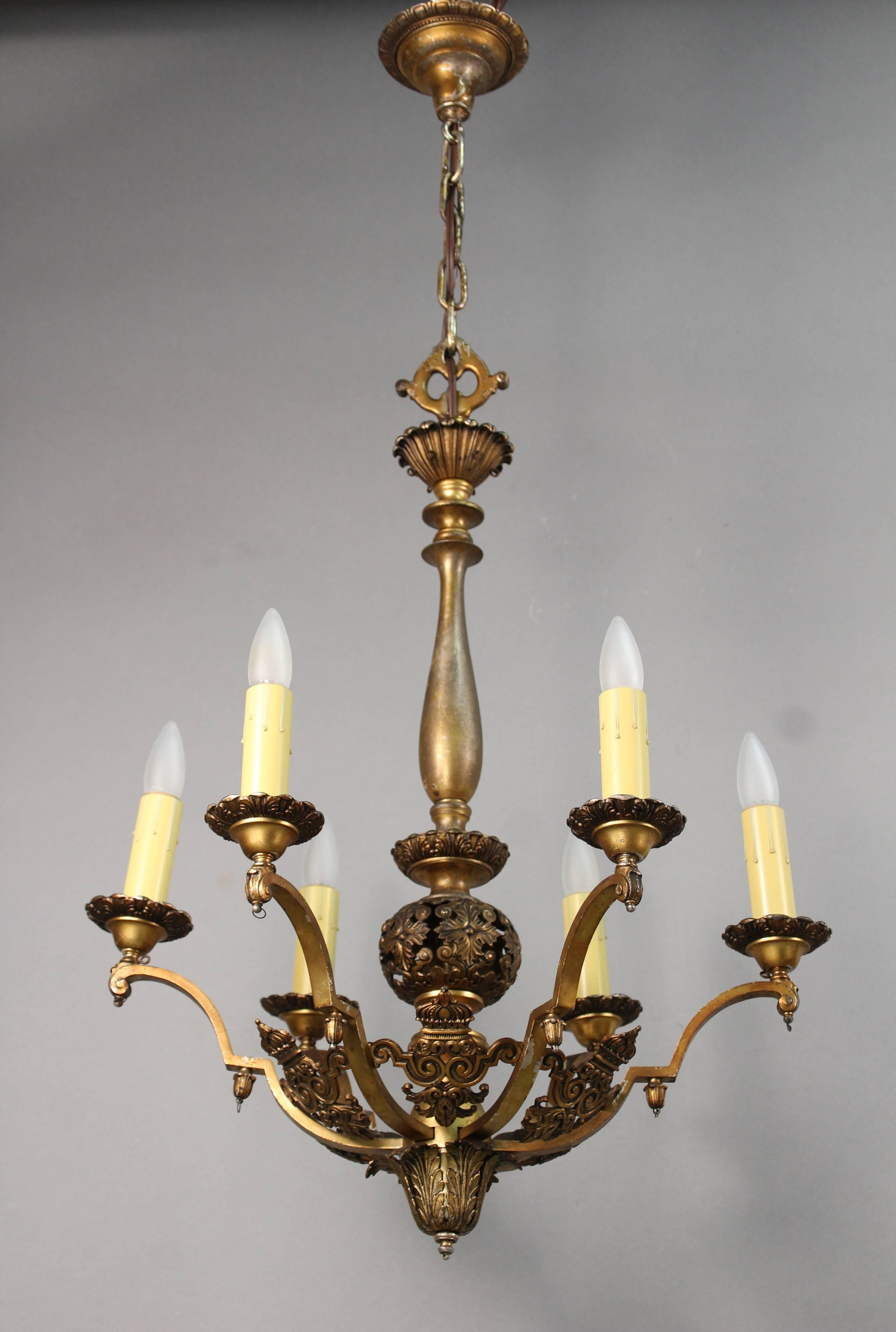 Elegant six-light chandelier with a tall profile. Intricate casting, circa 1920s. Measures: 31