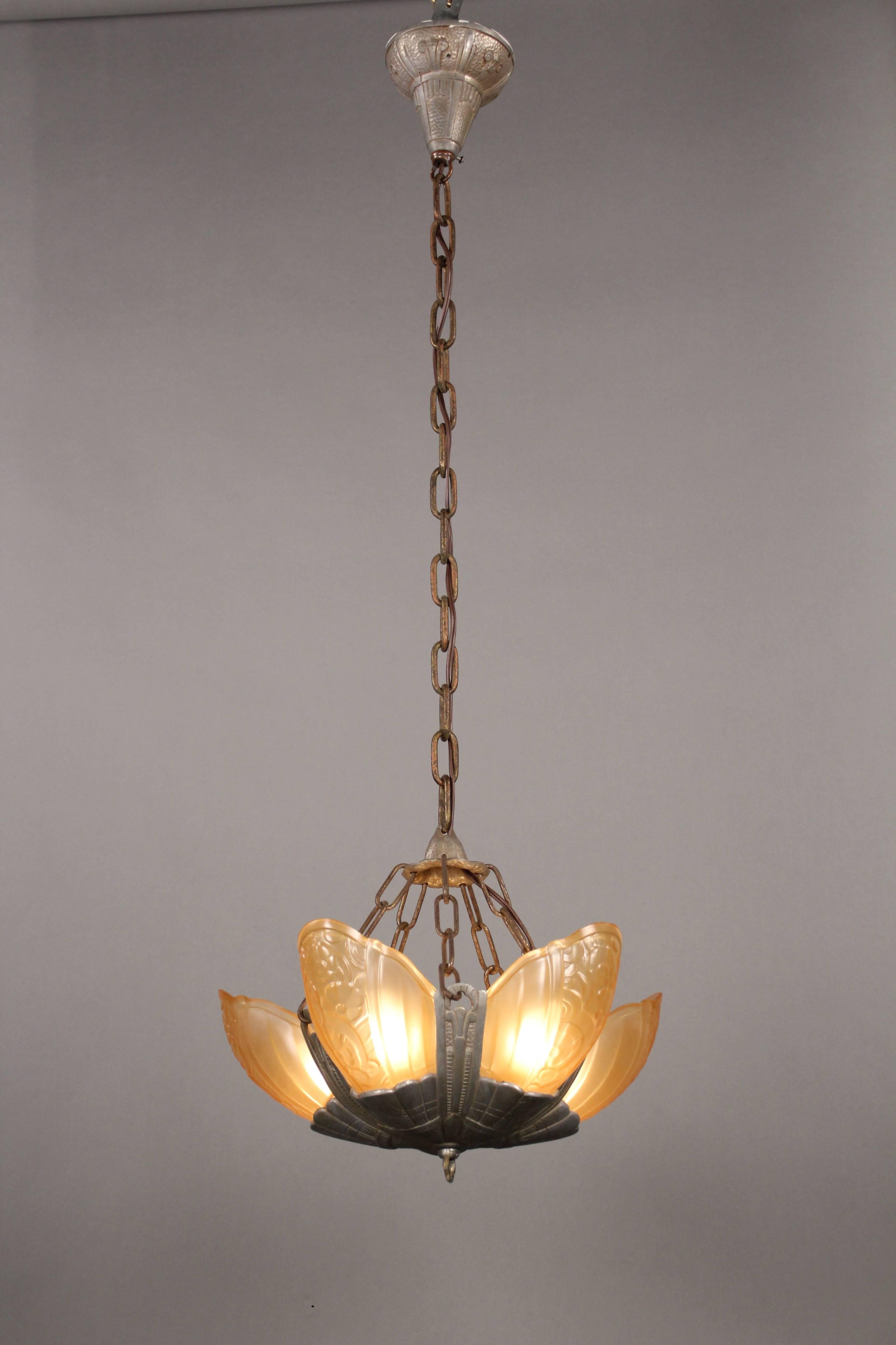 Beautiful 1930s chandelier with original glass insert. Original canopy. Measures: 13