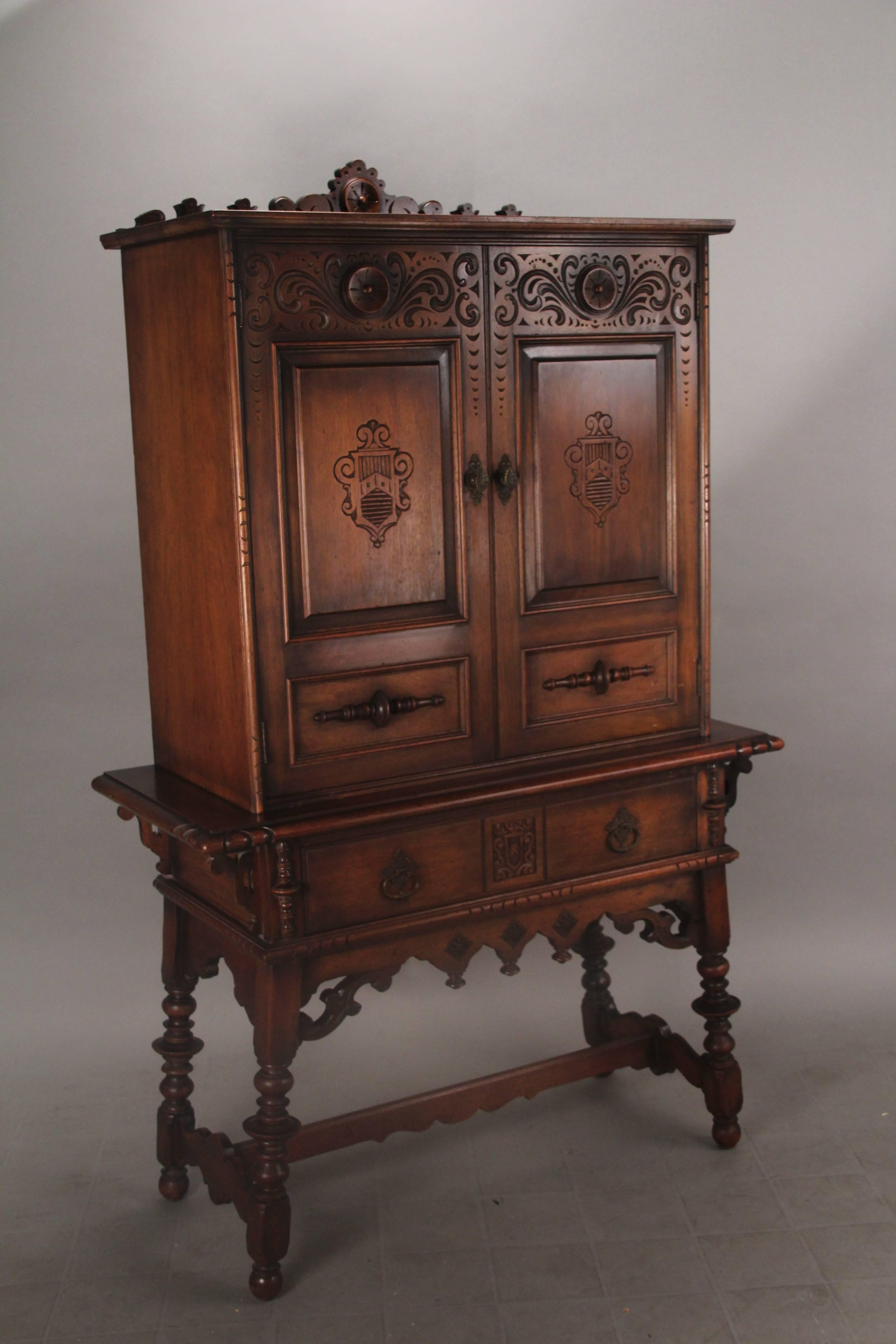 American 1920s Carved Walnut Cabinet