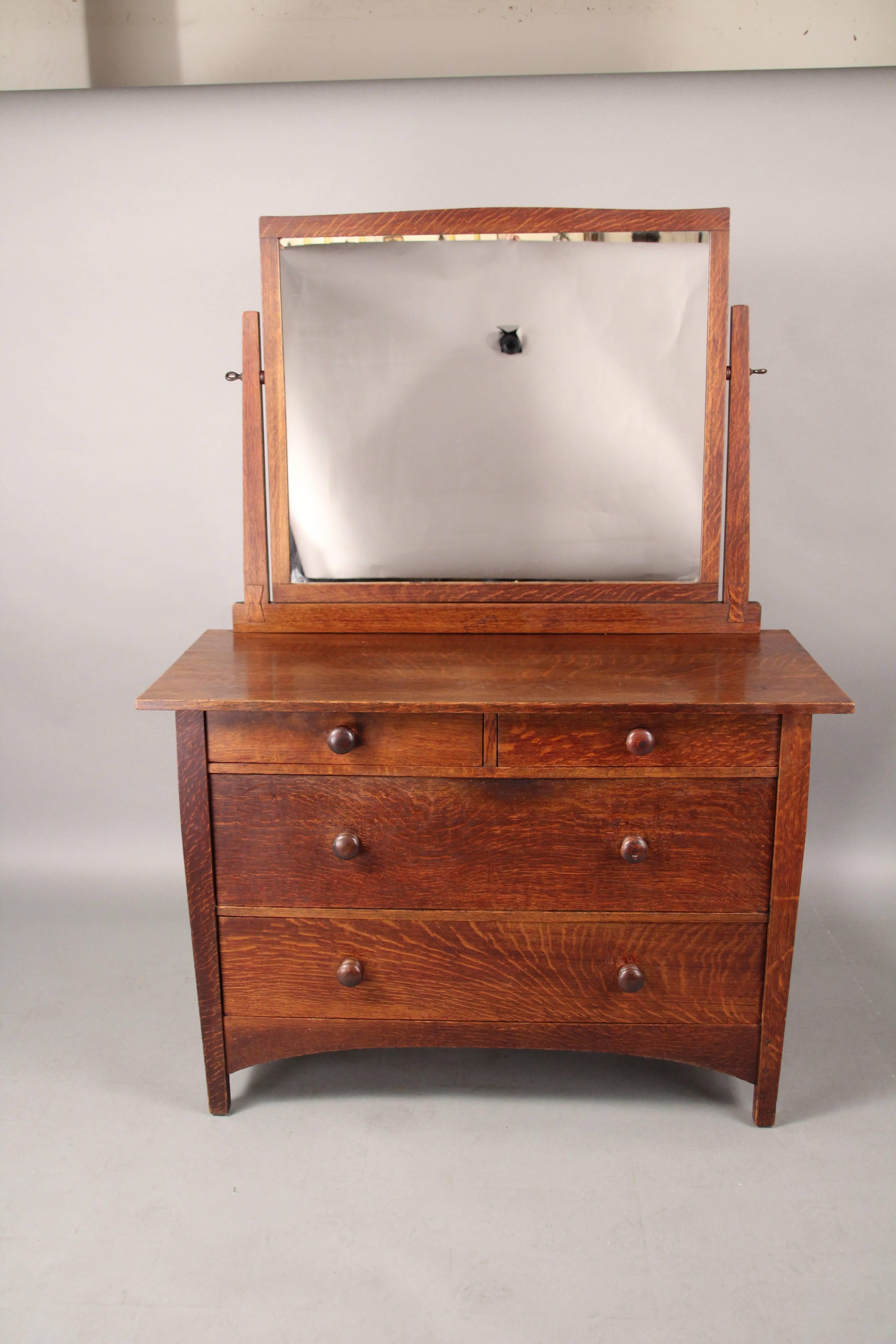 Dresser with mirror with original paper label. Good finish with minor wear.