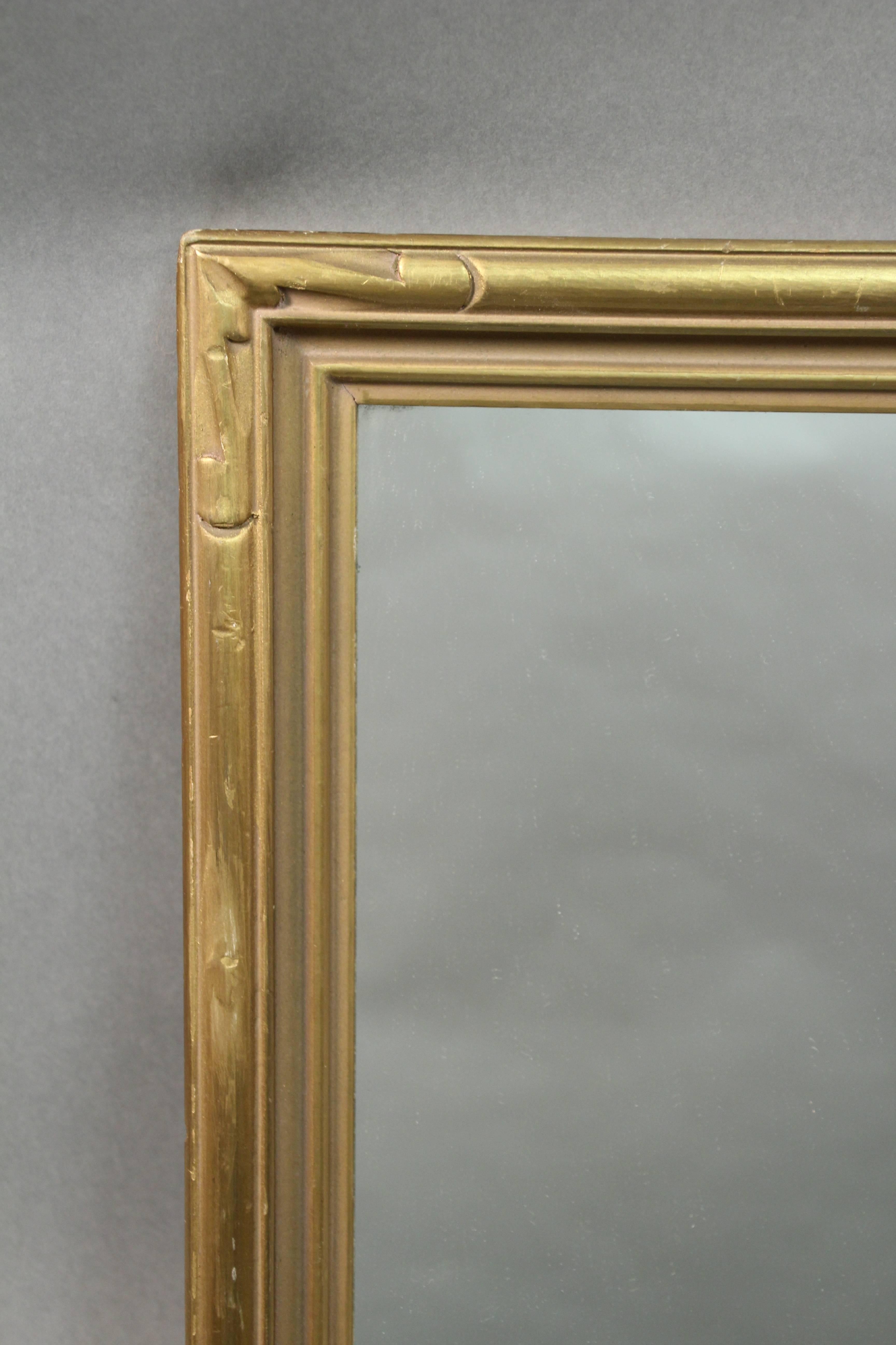 Mirror, circa 1920s. Carved wood frame. Original finish. Replaced mirror.