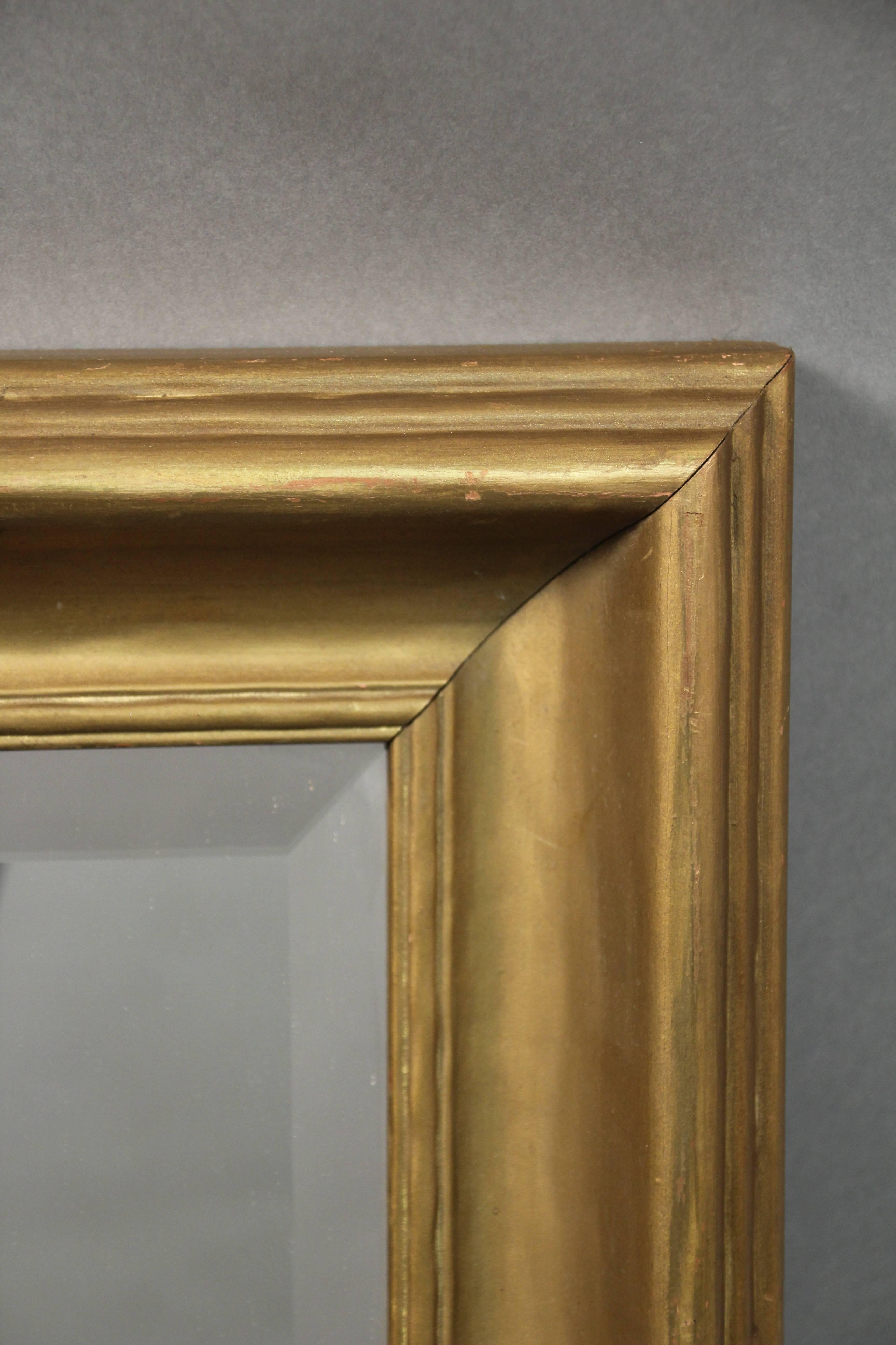 Simple mirror, circa 1920s. Carved wood. Original finish. New mirror.