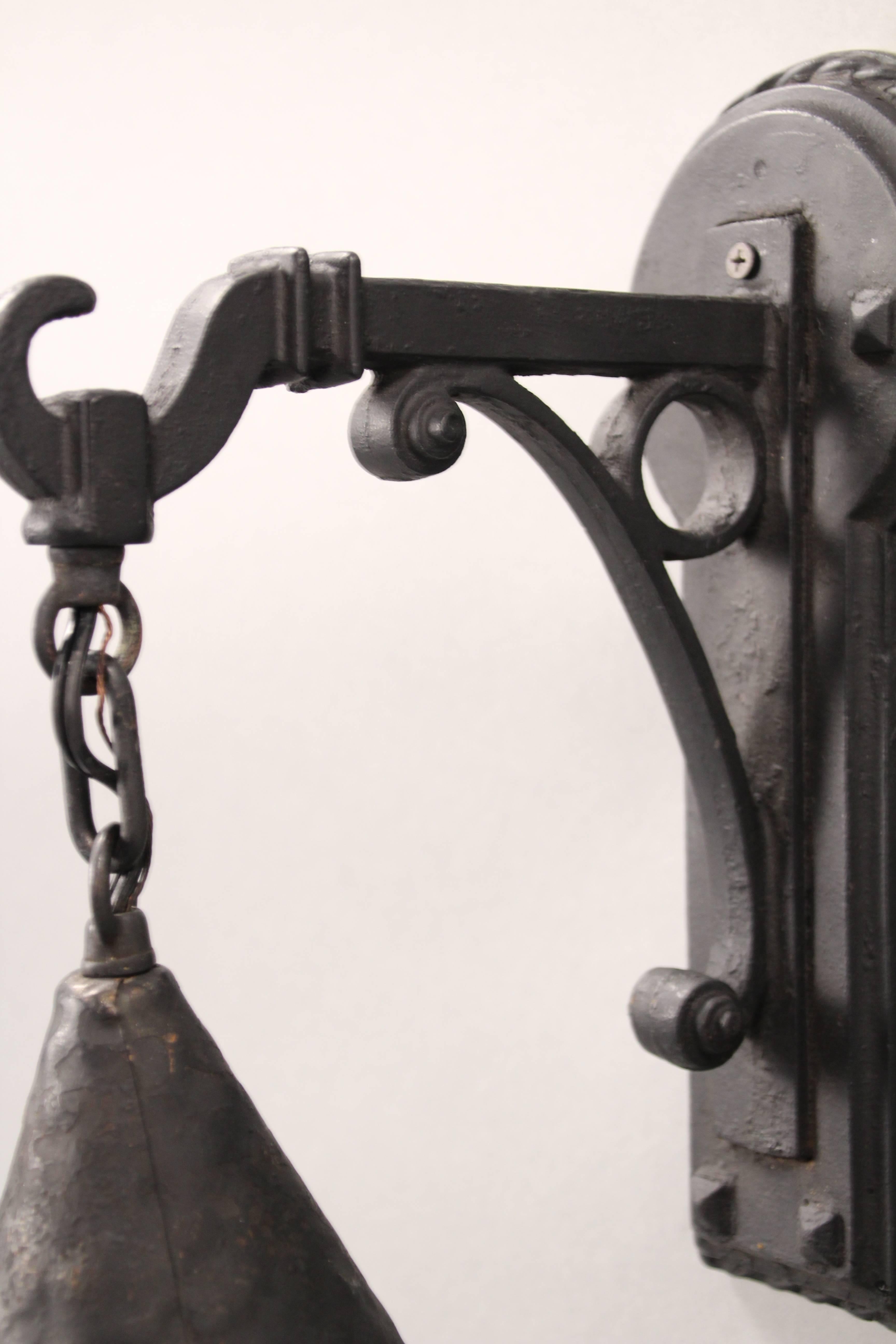 Priced for the pair, circa 1920s pair of exterior light with original slag glass.