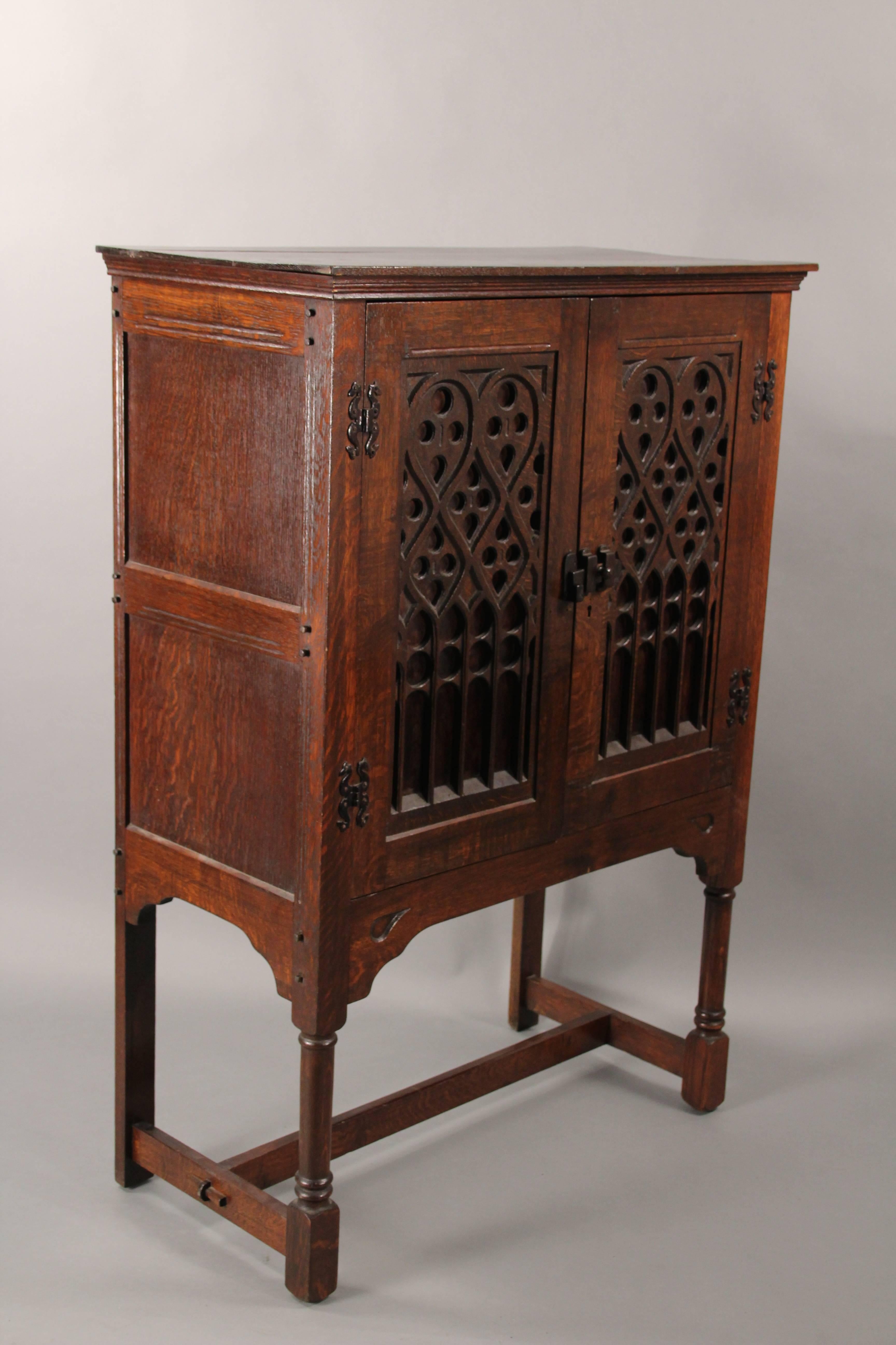 Spanish Colonial Turn of the Century Spanish Revival Cabinet with Carved Front with Iron Hardware