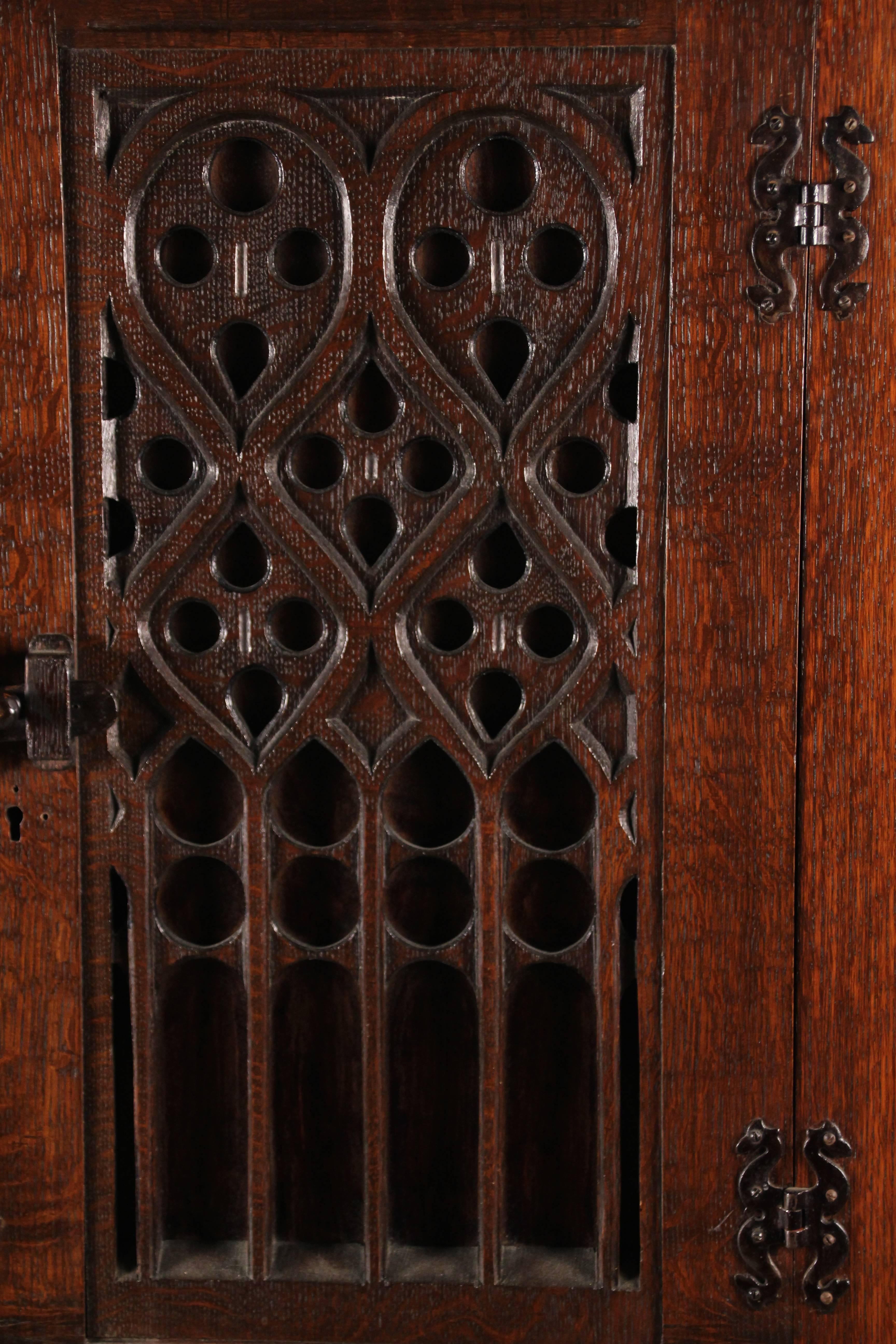 American Turn of the Century Spanish Revival Cabinet with Carved Front with Iron Hardware