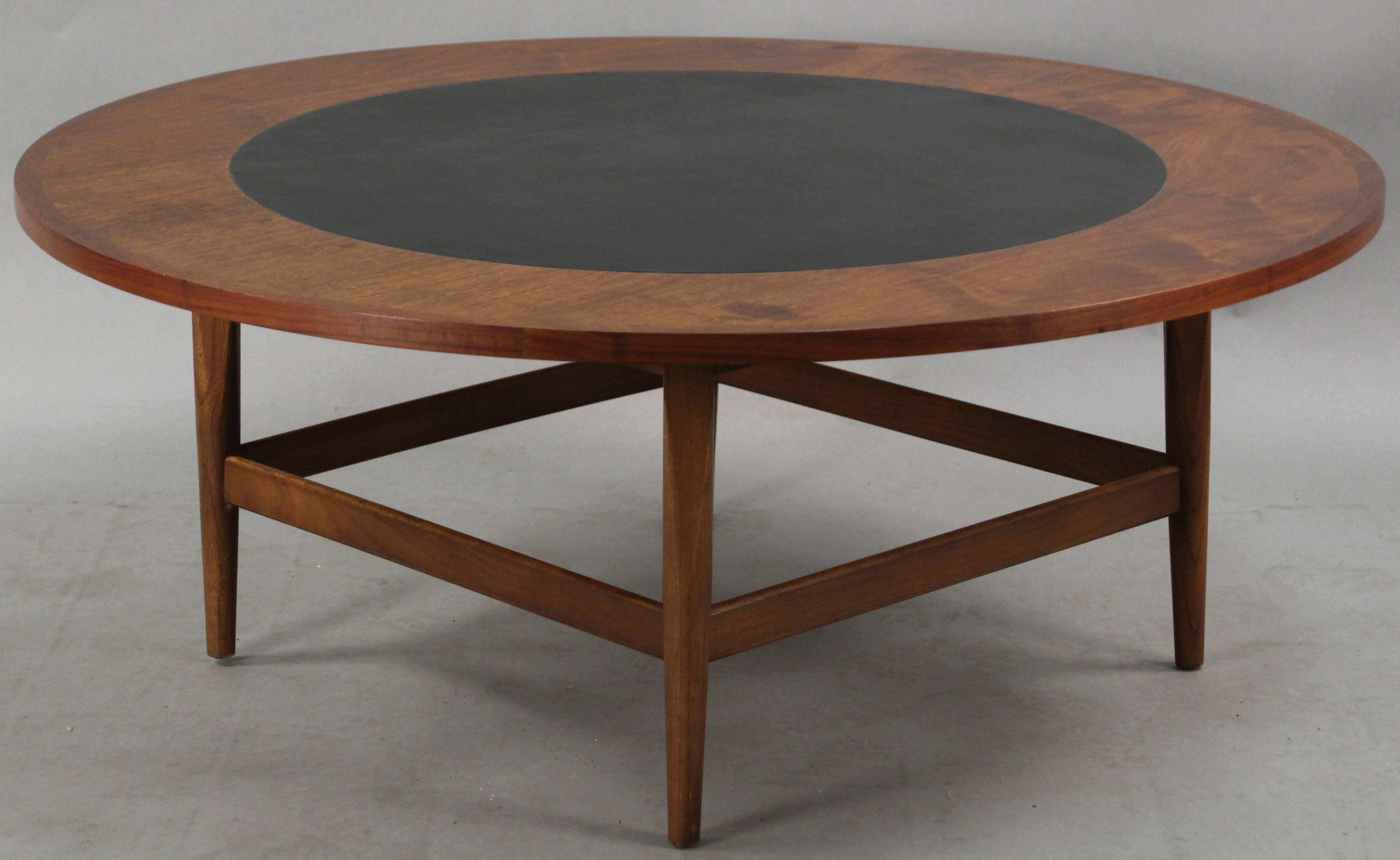 Wonderful round coffee table with clean, simple lines. Made by Lane.