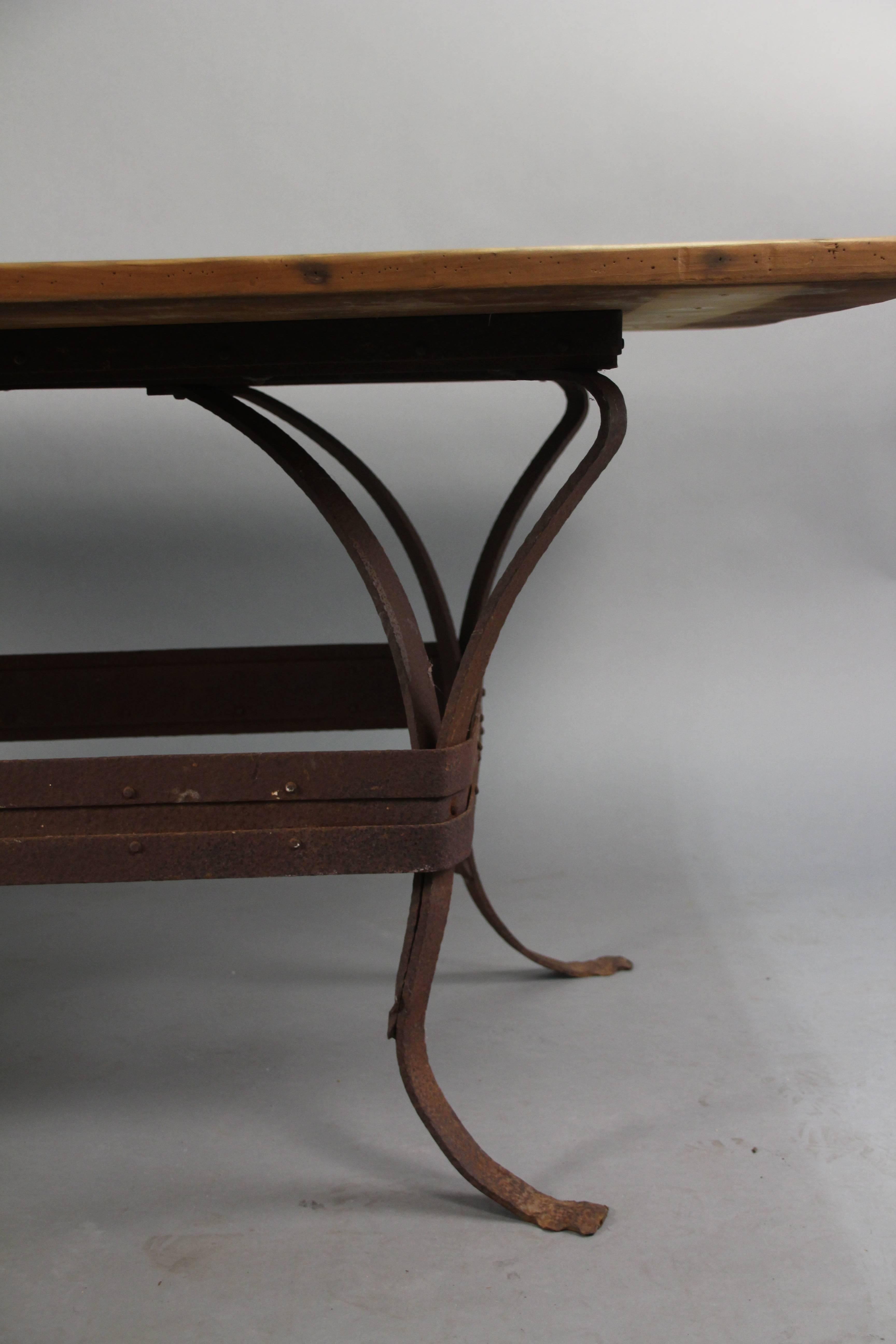 Industrial Antique Rustic Iron Table with Salvaged Top and Riveted Construction For Sale