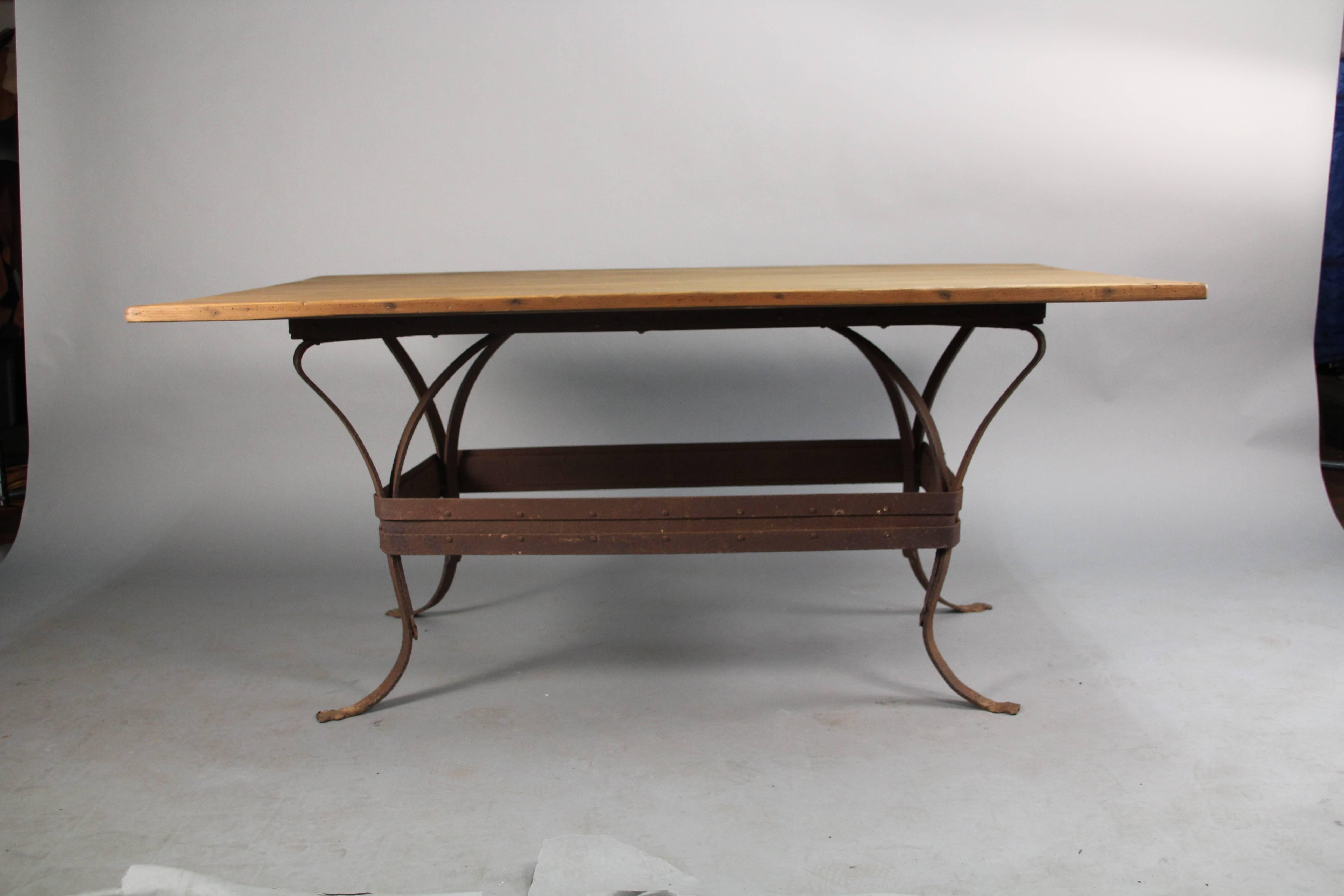 Mid-20th Century Antique Rustic Iron Table with Salvaged Top and Riveted Construction For Sale