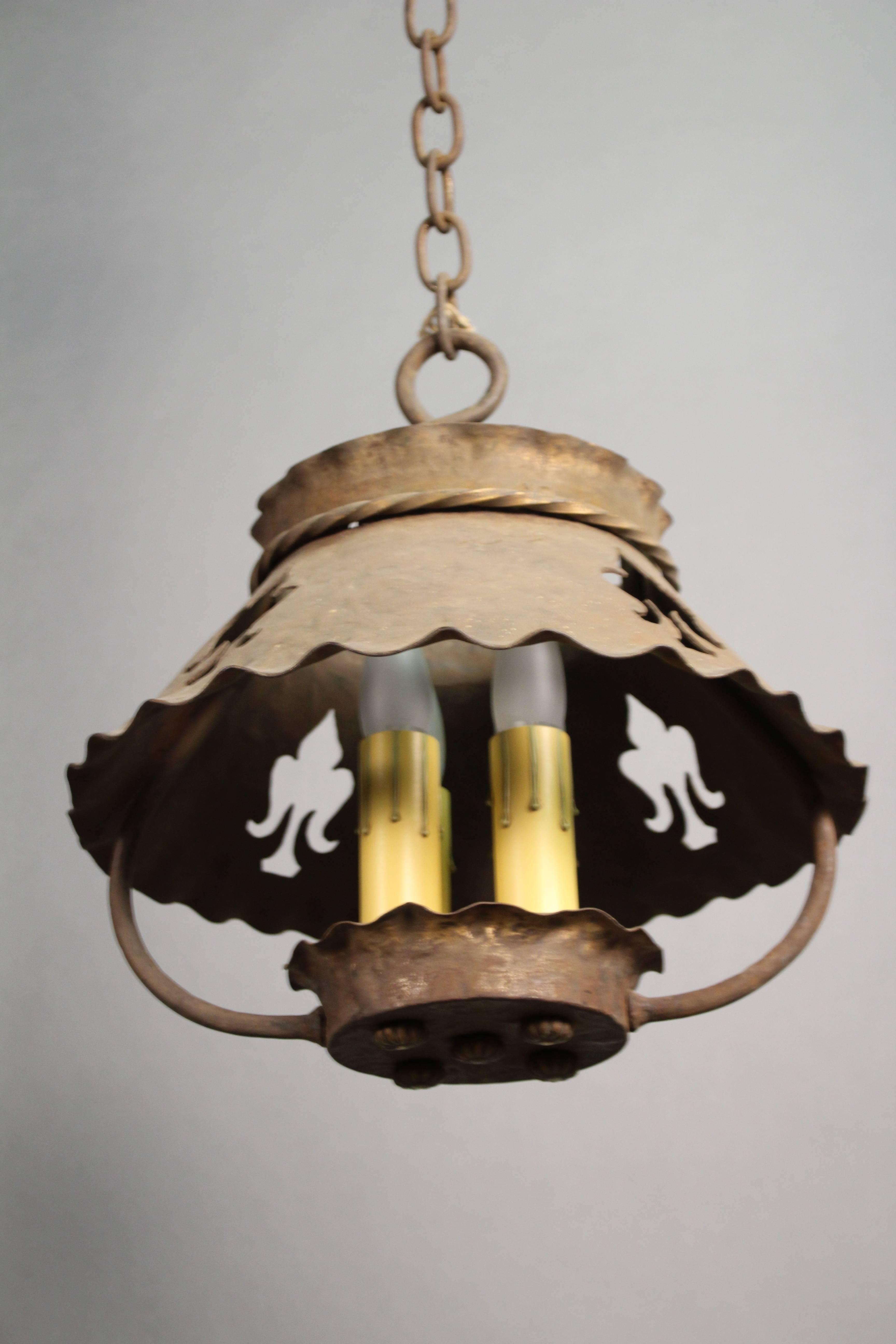 Iron chandelier with cut outs, circa 1930s. Original finish. 14.25