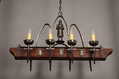 Antique 1930s Spanish Revival Wood and Iron Eight-Light Chandelier with Knight