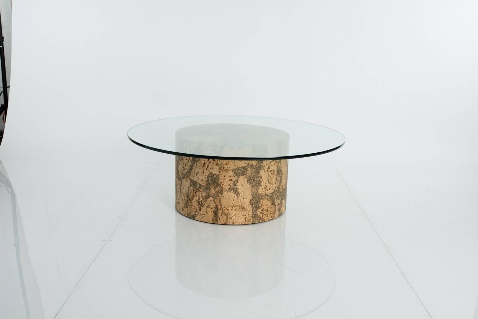 Round cork coffee table with a glass top, crafted in the manner of Paul Frankl.
