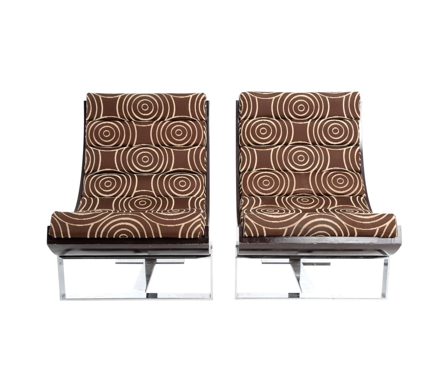 Pair of 1970s chrome and lacquer swing chairs with their original upholstery.
 