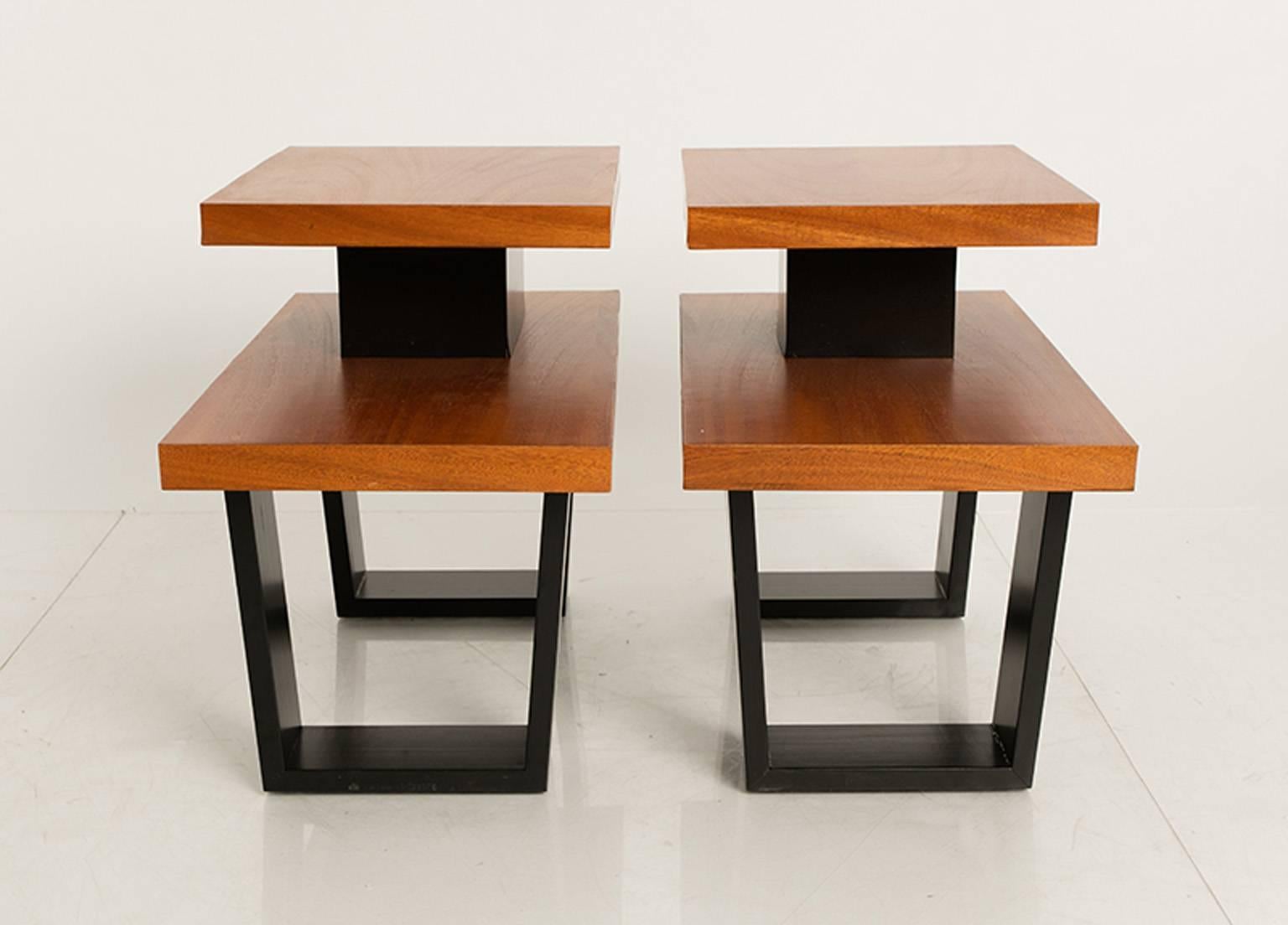 Pair of ebony and mahogany step side tables by Paul Frankl.