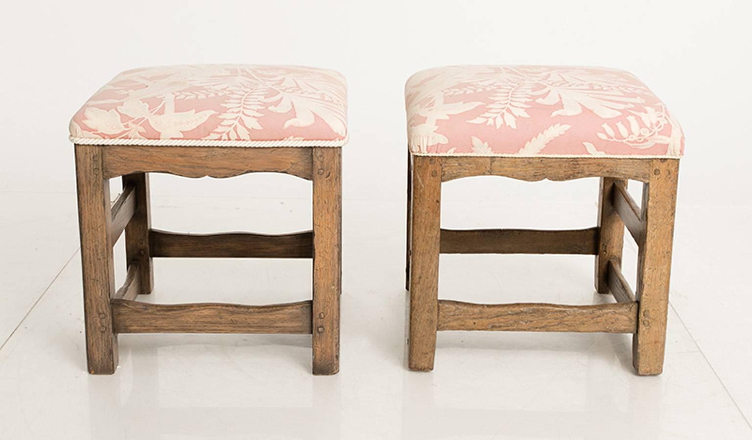 Pair of French, oak stools covered in a vintage chintz, floral fabric.