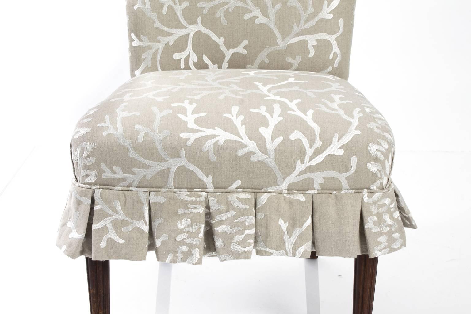 English slipper chair with mahogany reeded legs. Newly re-upholstered.