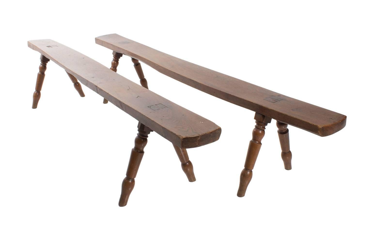 Pair of rustic, 19th century elmwood hall benches. Considerable stains and wear.

  