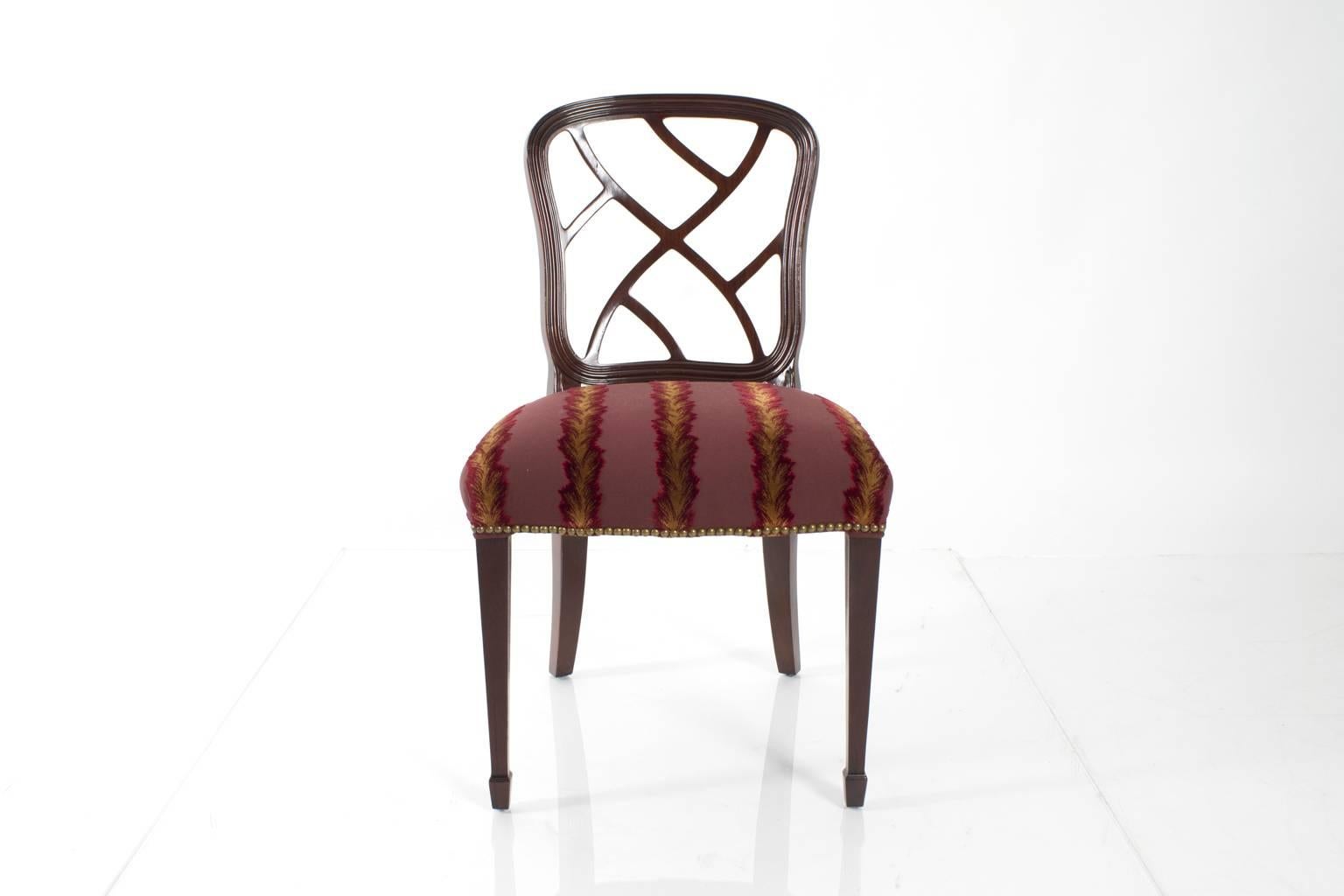Set of eight mahogany, English style dining chairs upholstered in cut velvet fabric. 

Armchair dimensions: W: 22
