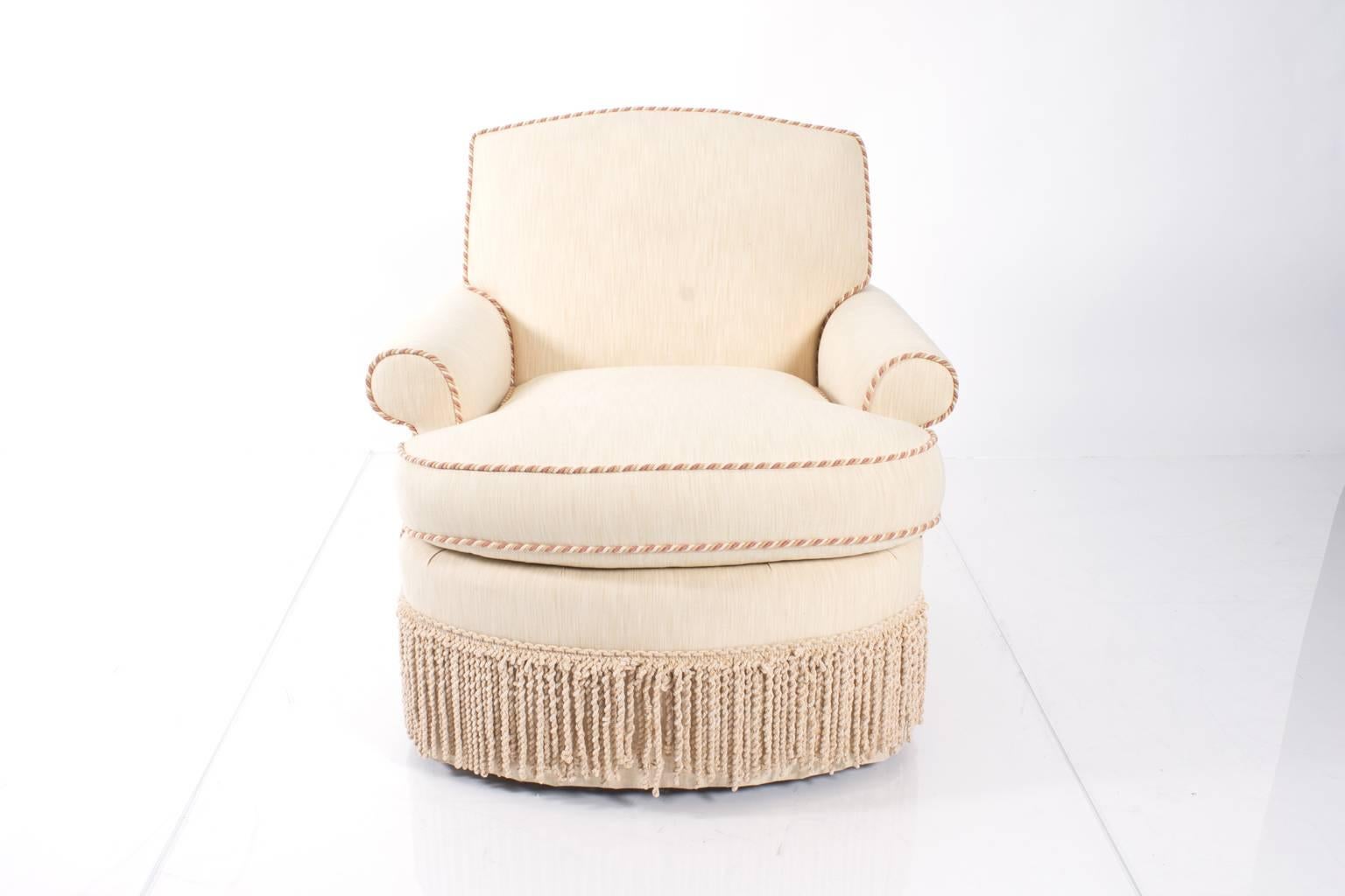 Custom upholstered English club chair in shades of pink and tan.
  