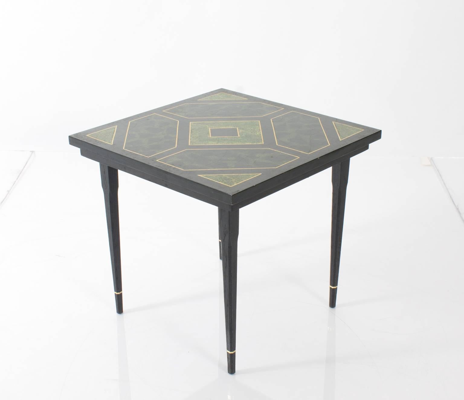 Eller design black lacquer and faux malachite table.