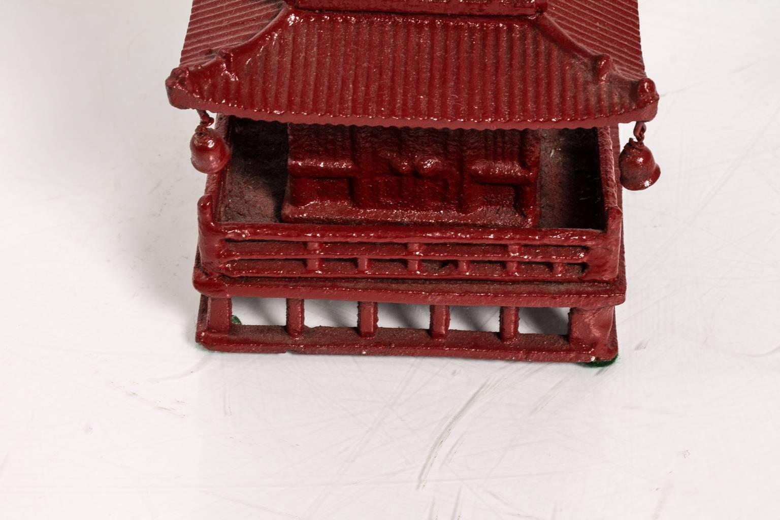 Red Iron Pagoda Ornament In Fair Condition In Stamford, CT
