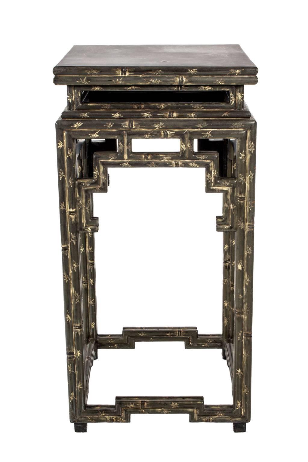 Pair of early 20th century faux bamboo Chinese side tables. Hand-painted and gilded.