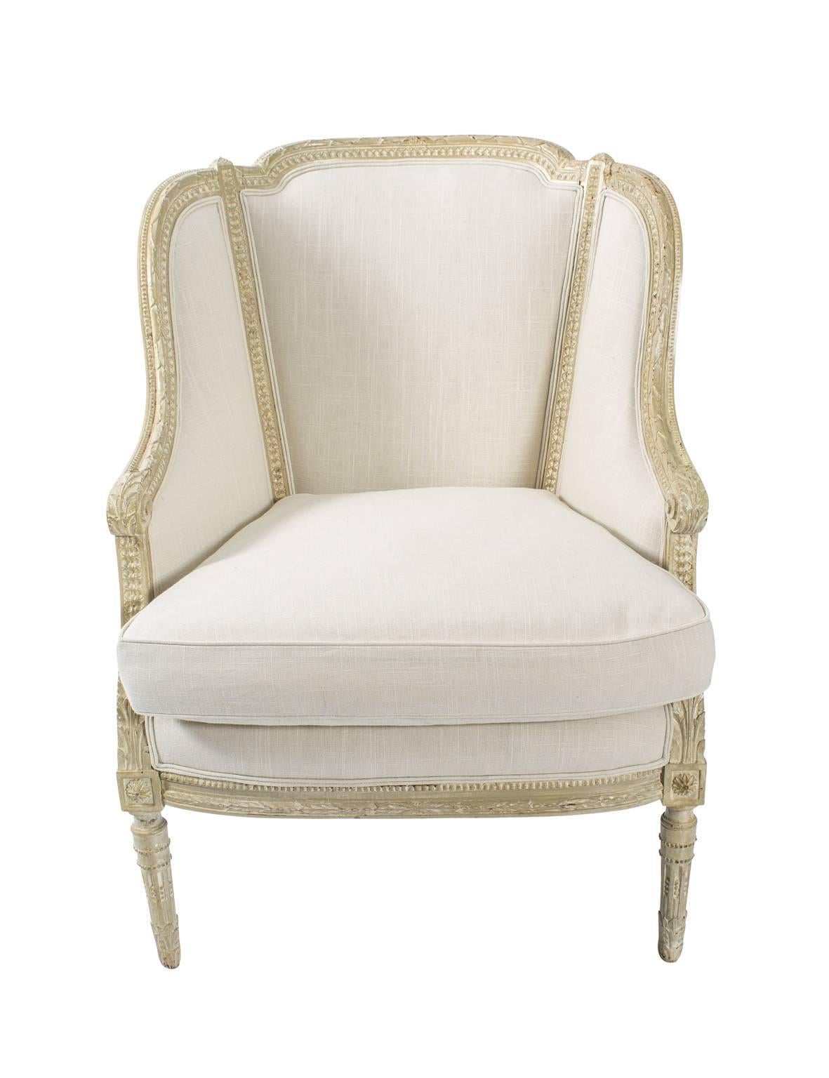 Pair of Louis XVI style armchairs upholstered Richard Allen fabric.