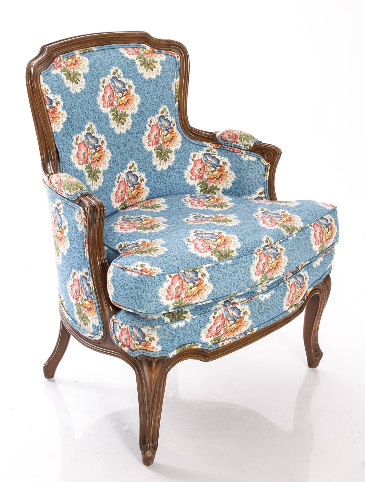 Petite bergère chair upholstered in Brunschwig fabric.