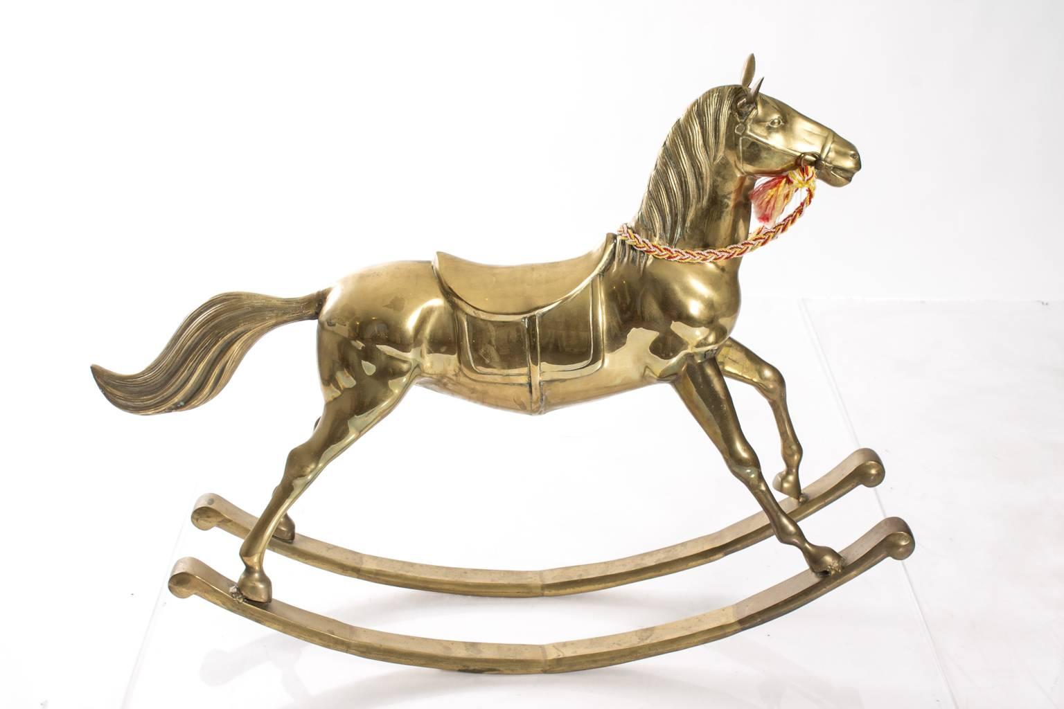 Vintage brass rocking horse.